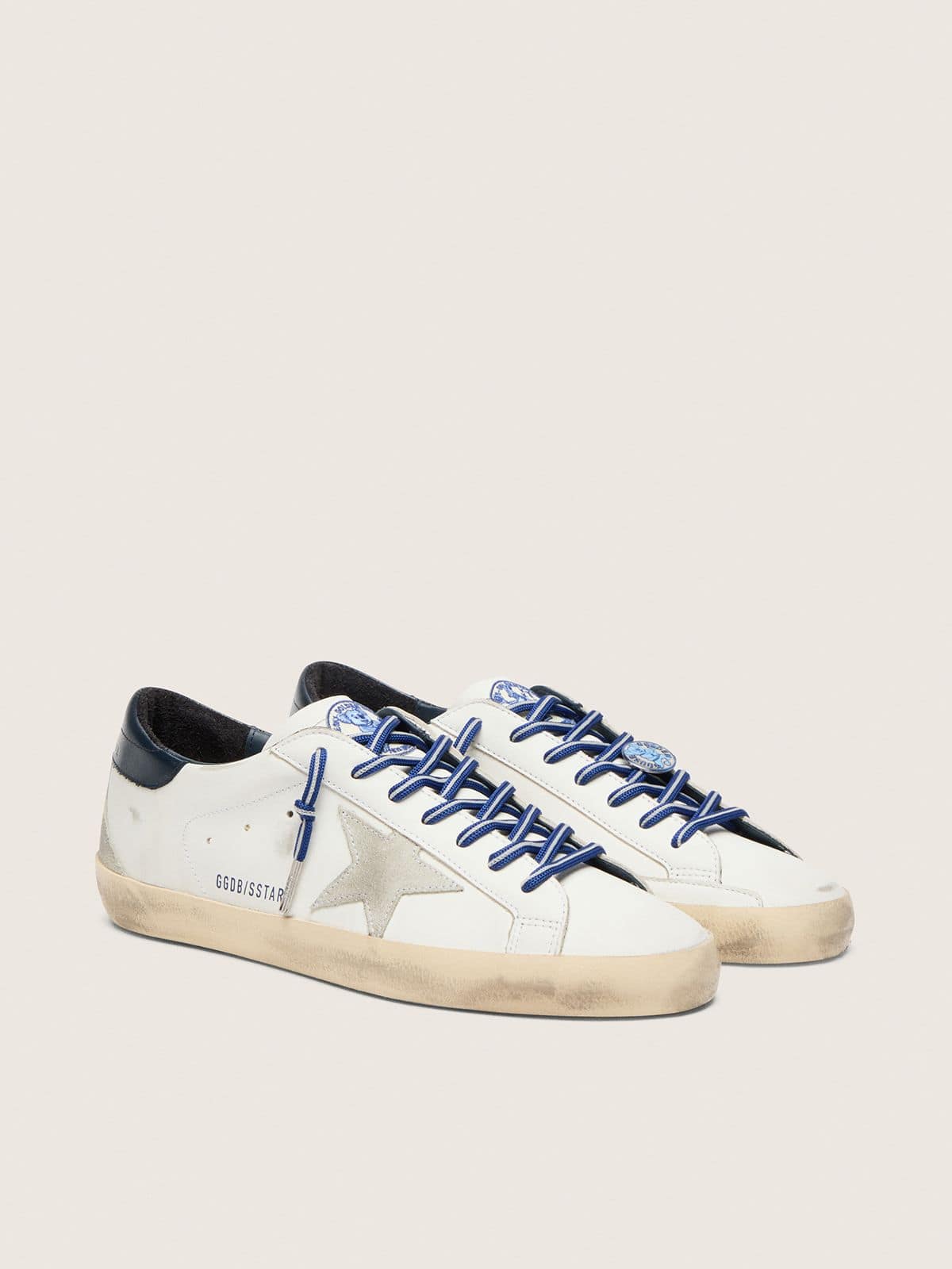 Women&rsquo;s tennis-inspired Super-Star LTD in white leather with suede star and blue leather heel tab