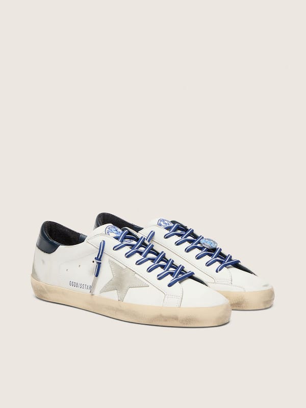 Women&rsquo;s tennis-inspired Super-Star LTD in white leather with suede star and blue leather heel tab