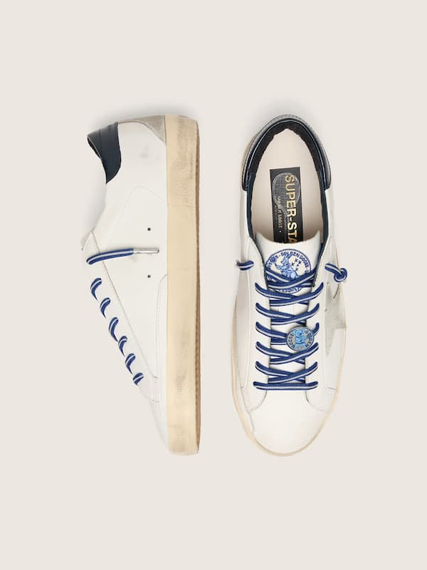 Women&rsquo;s tennis-inspired Super-Star LTD in white leather with suede star and blue leather heel tab