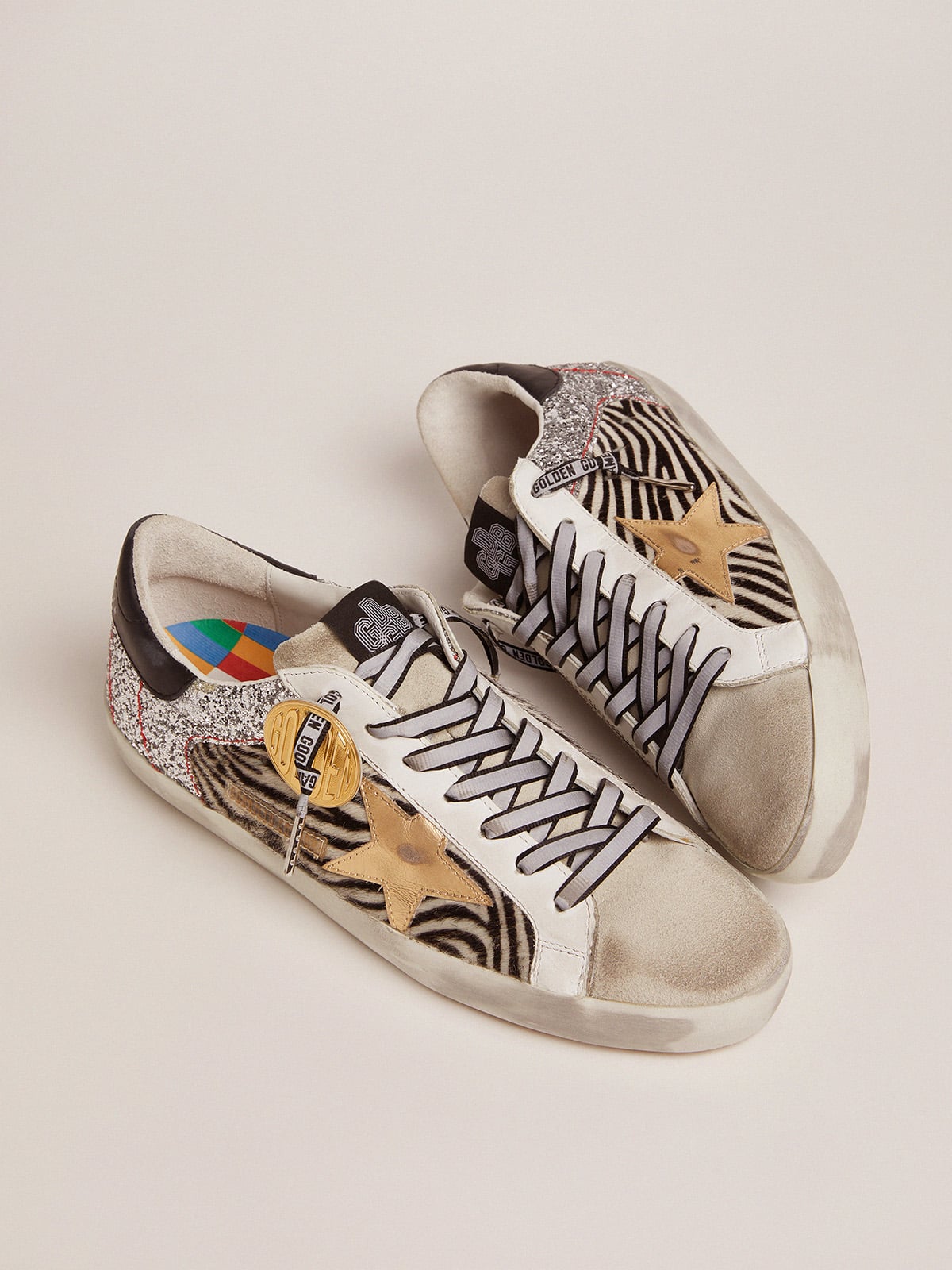 Golden Goose - Women’s Super-Star sneakers in zebra-print pony skin and silver glitter in 