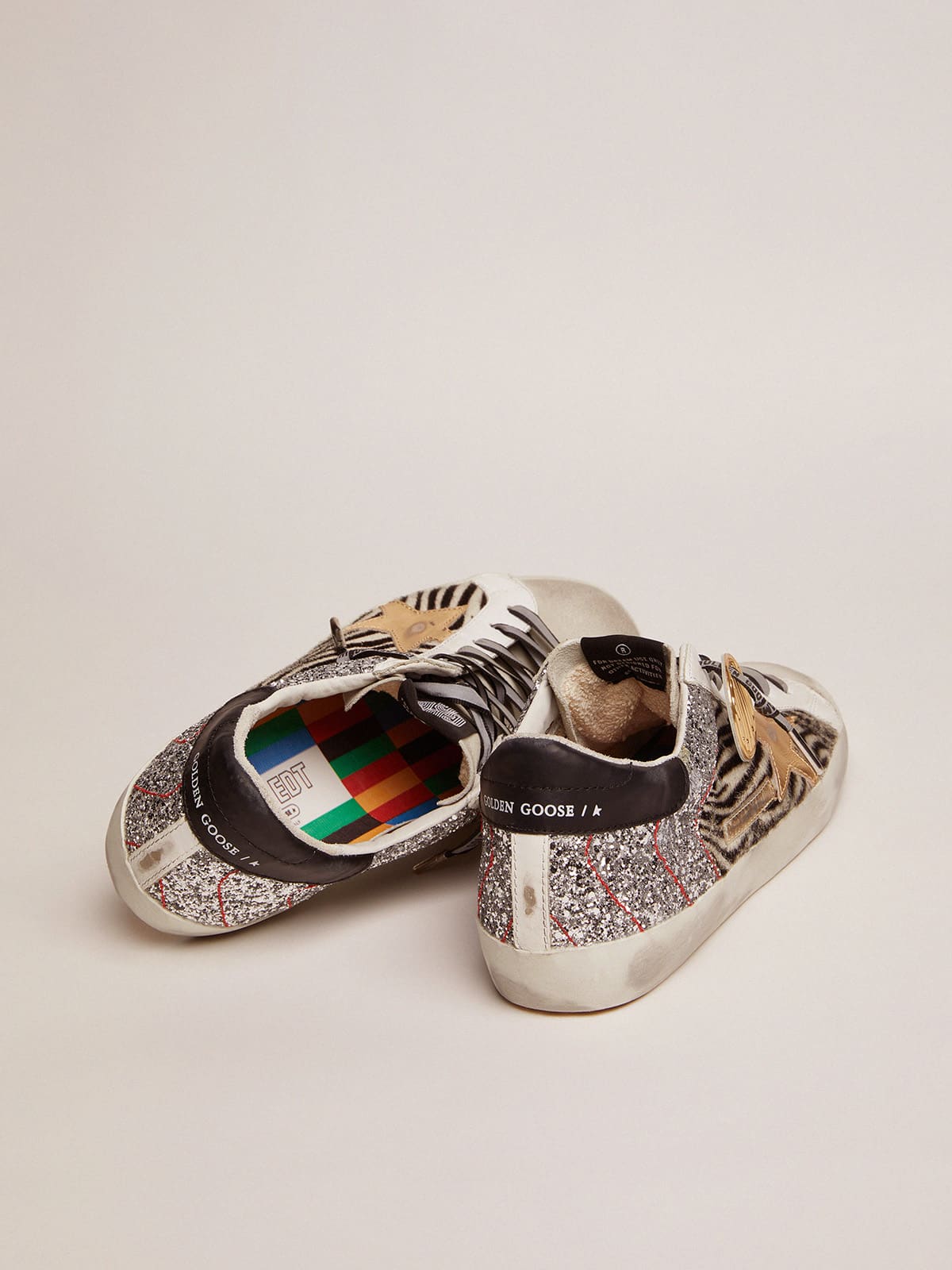 Golden Goose - Women’s Super-Star sneakers in zebra-print pony skin and silver glitter in 