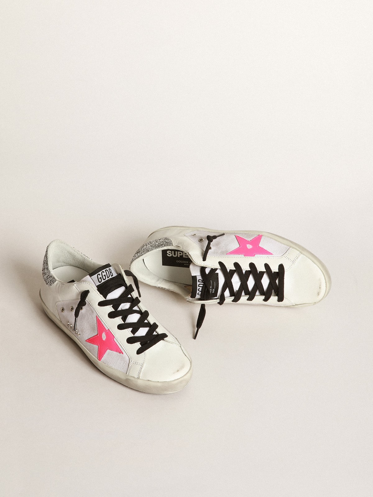 Golden Goose - Super-Star sneakers in white leather and canvas with shocking-pink leather star and silver glitter heel tab in 