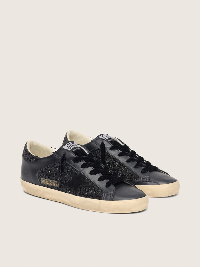Golden Goose - Super-Star Donna in glitter neri con stella in suede nero e inserti in pelle in 