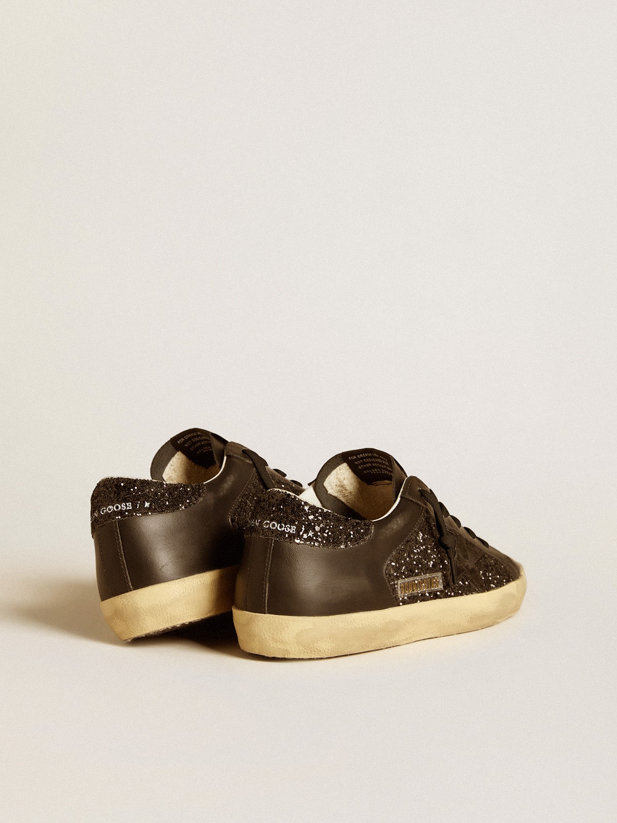 Golden Goose - Women's Super-Star in black glitter with black suede star and leather inserts in 