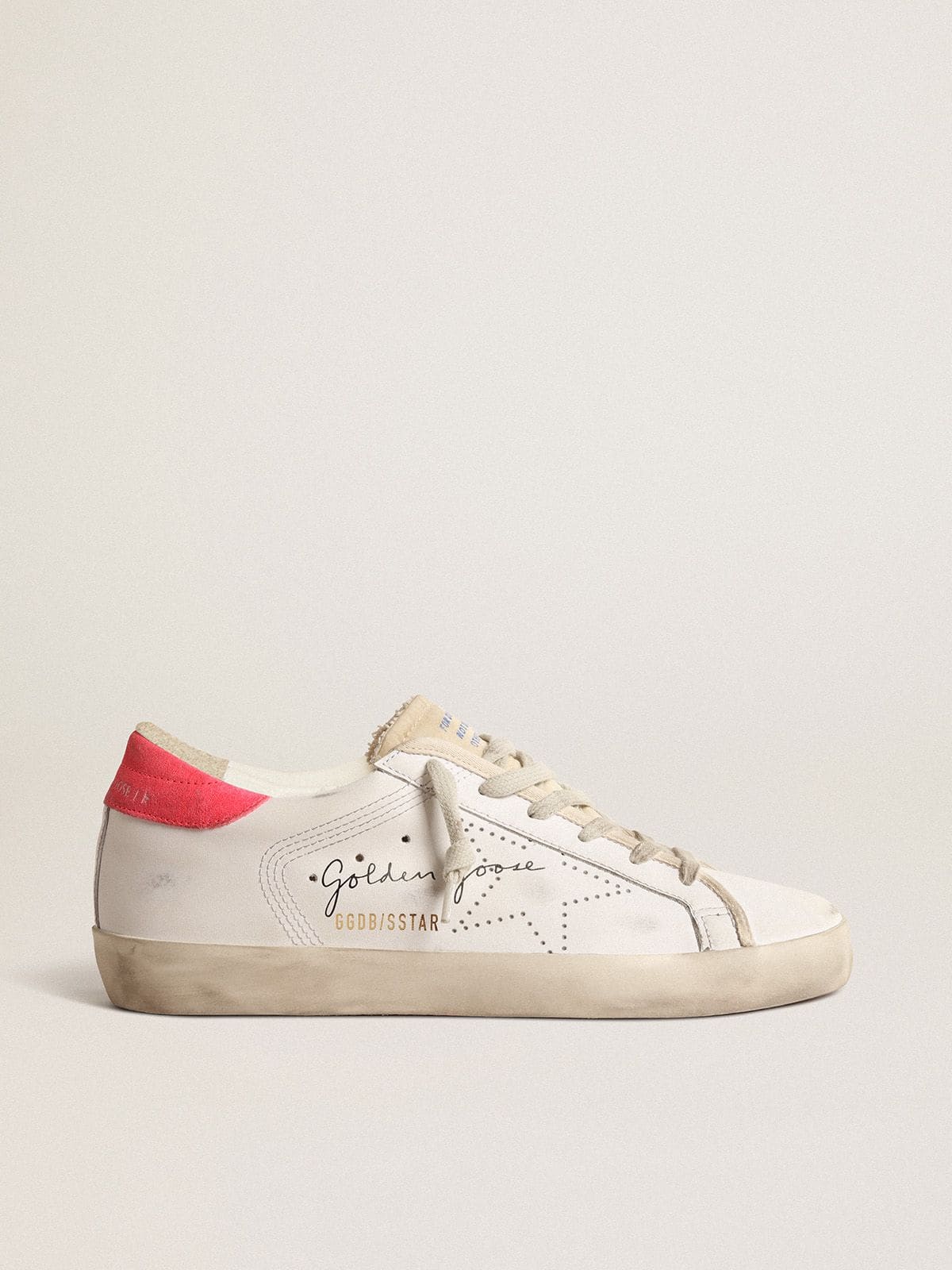 Golden Goose - Women's white leather Super-Star with perforated star and fuchsia nylon heel tab in 