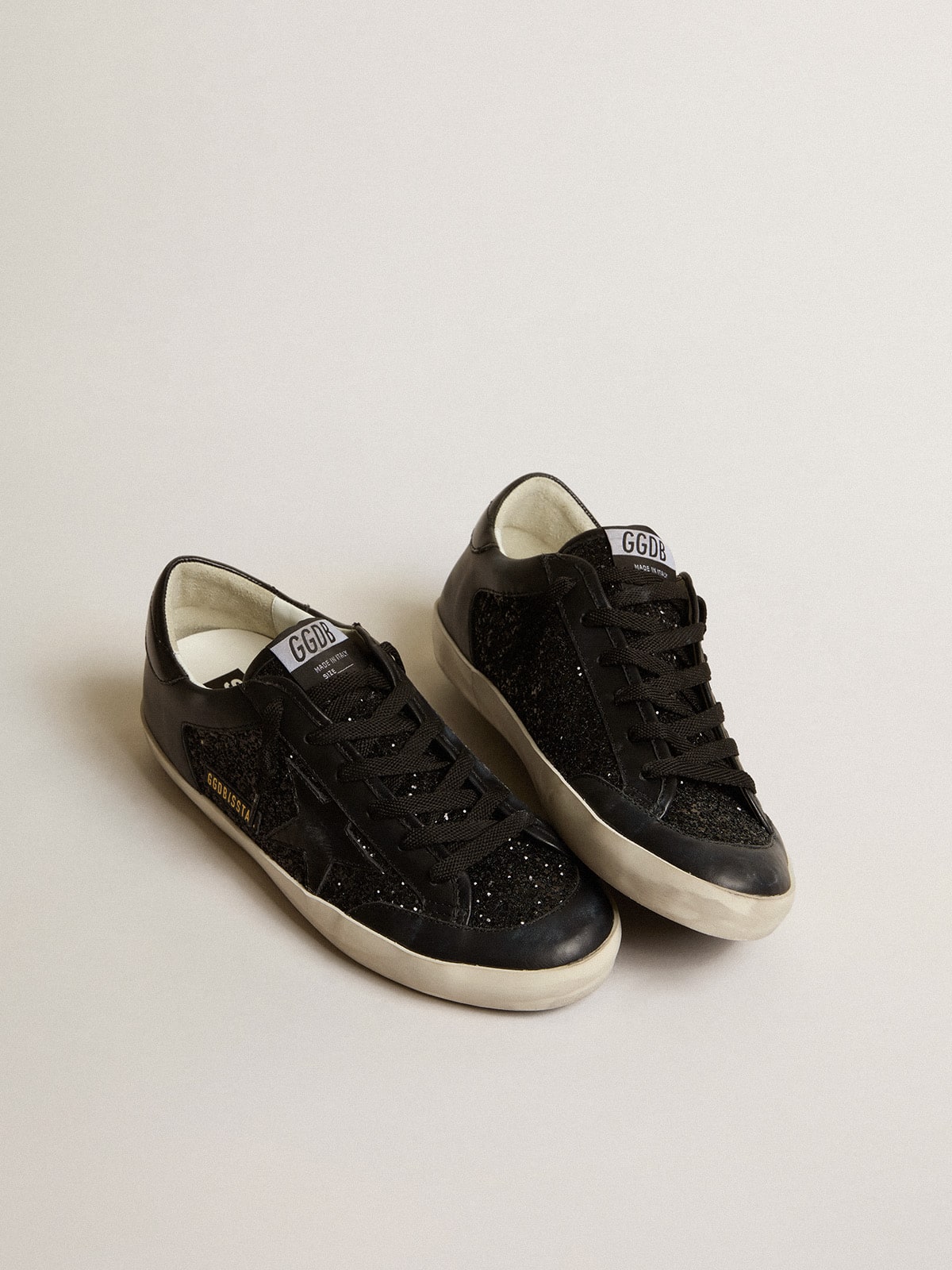 Women s Super Star in black nappa and glitter with glossy black leather star Golden Goose