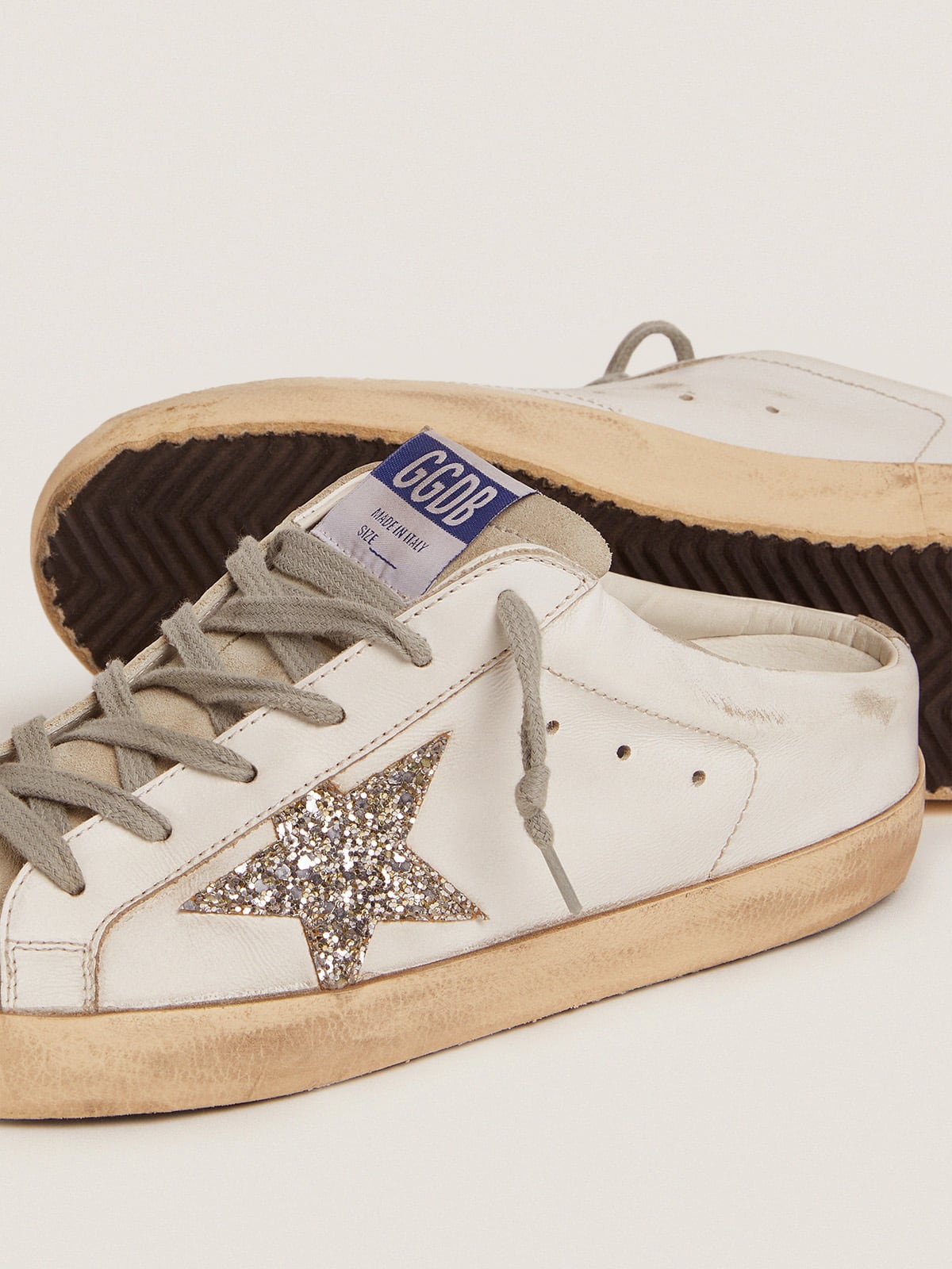 Golden Goose - Super-Star Sabot with a platinum glitter star and suede tongue in 