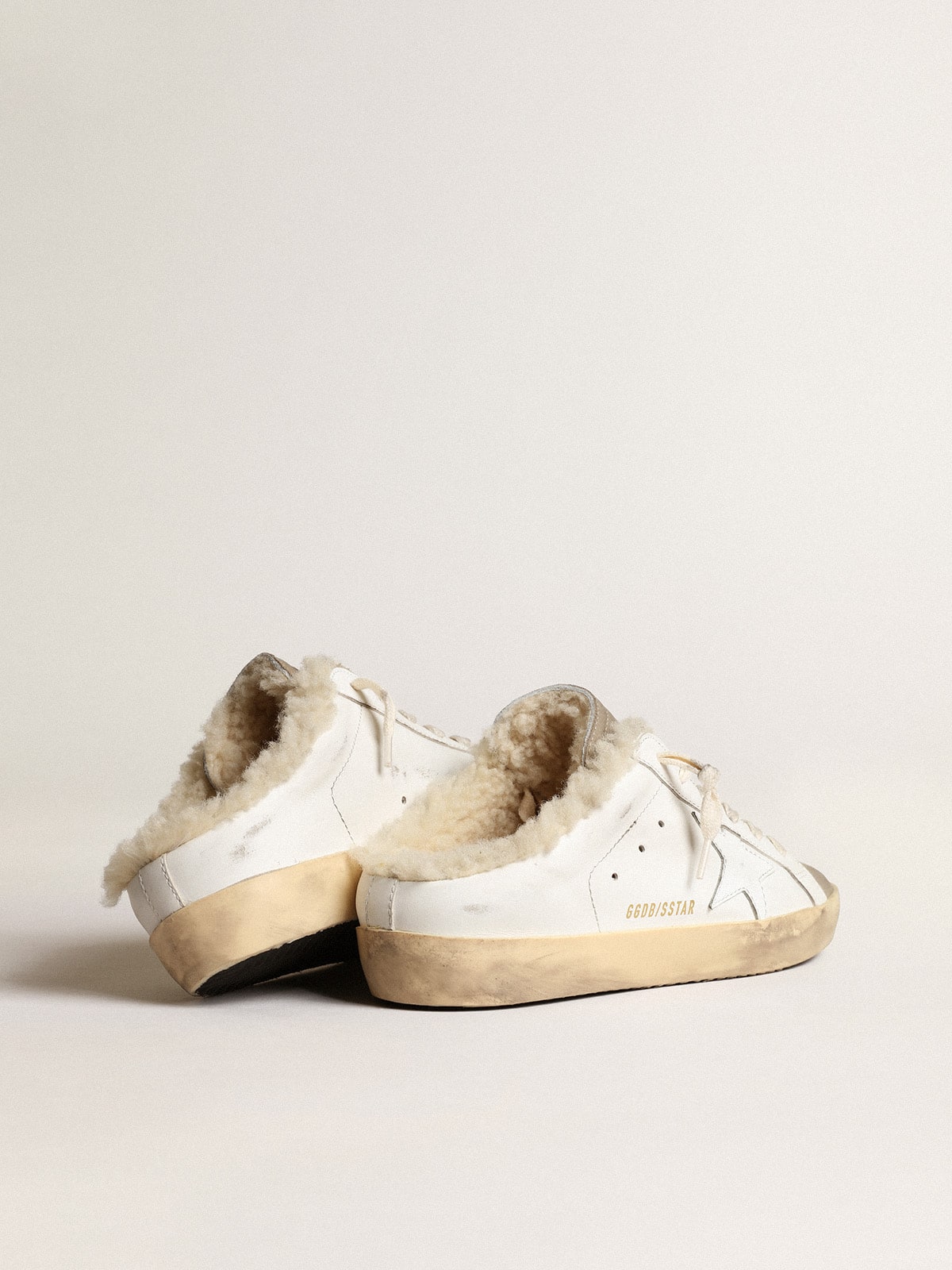 Super Star Sabots with white leather star and shearling lining Golden Goose