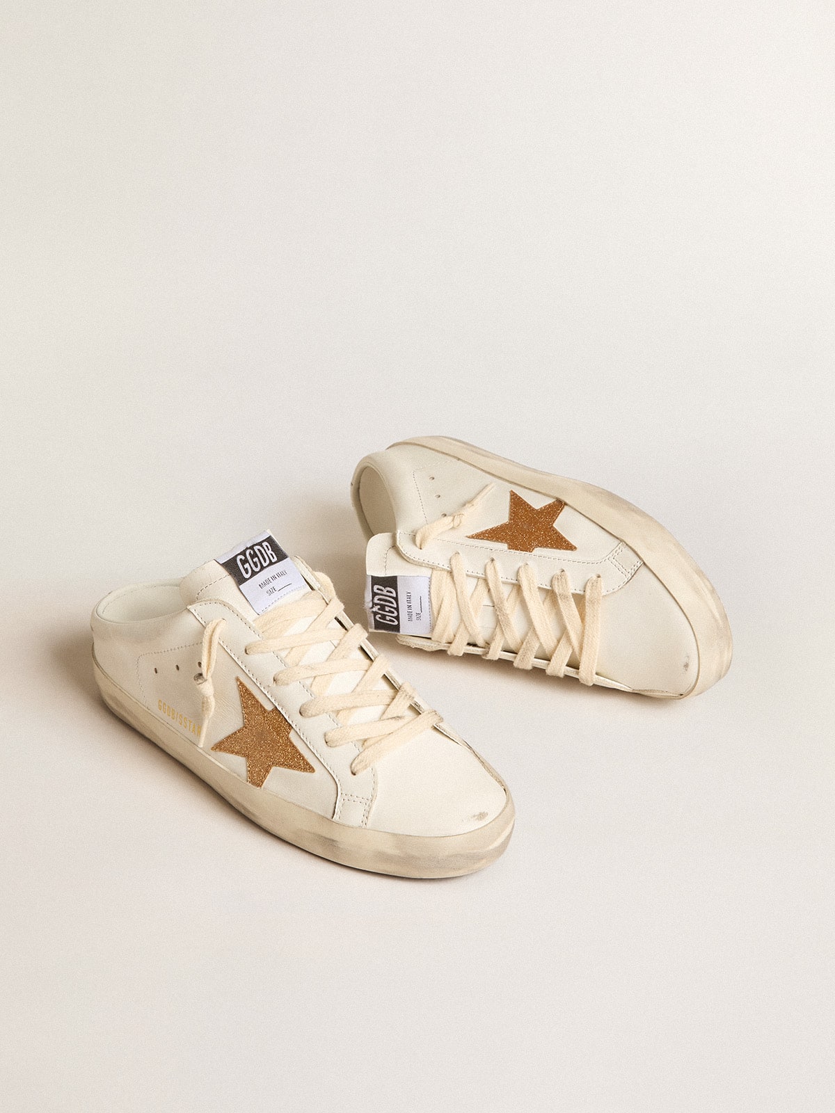 Golden Goose - Mule Super-Star de couro com estrela de glitter dourado plastificado in 