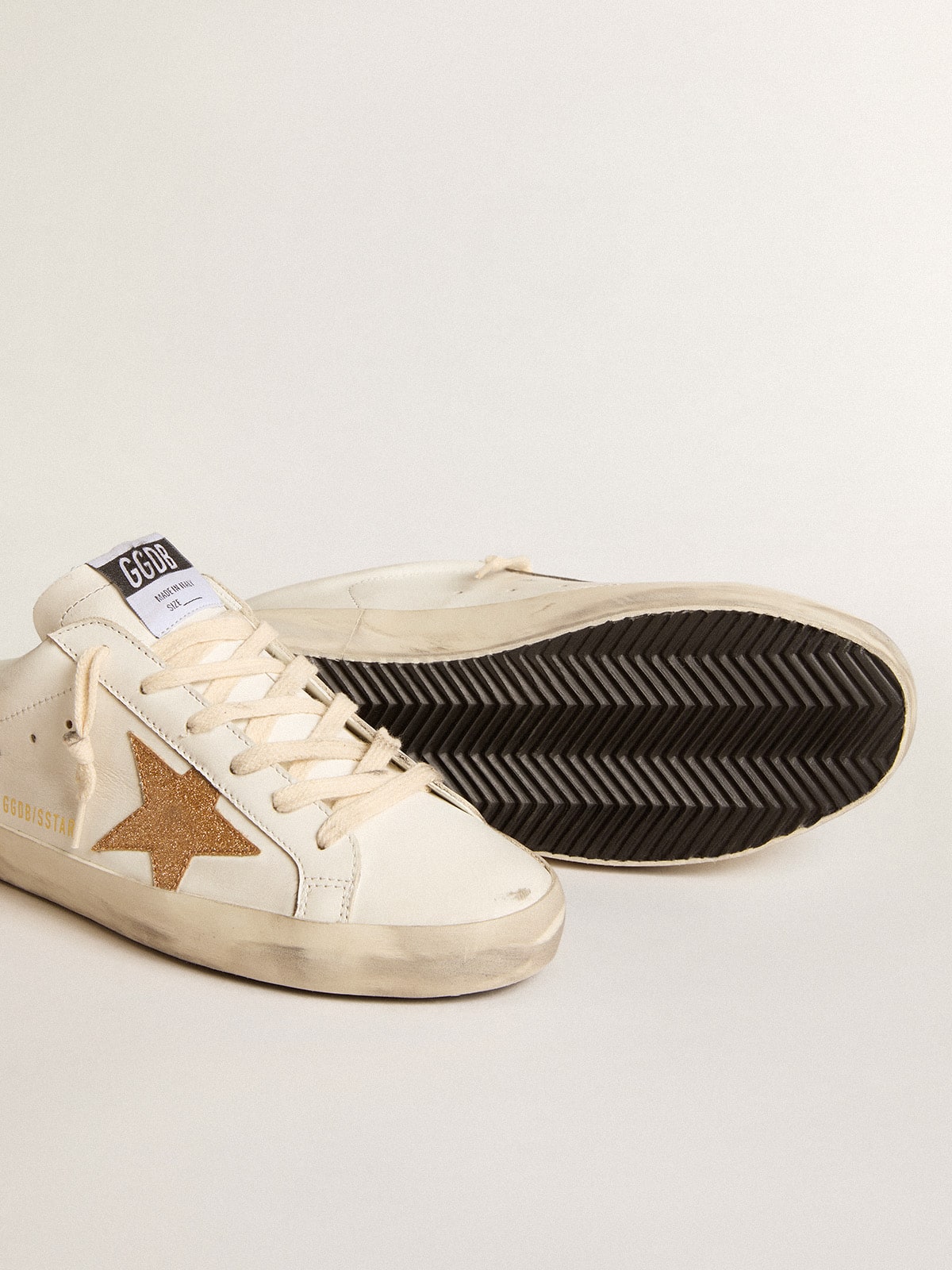 Golden Goose - Mule Super-Star de couro com estrela de glitter dourado plastificado in 