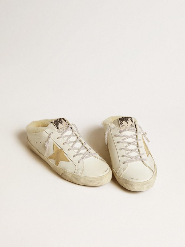 Golden Goose - Women’s Super-Star Sabots with gold suede star and shearling lining in 