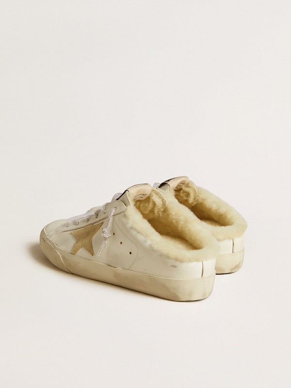 Golden Goose - Women’s Super-Star Sabots with gold suede star and shearling lining in 