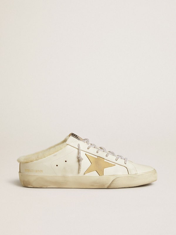 Golden Goose - Women’s Super-Star Sabots with gold suede star and shearling lining in 