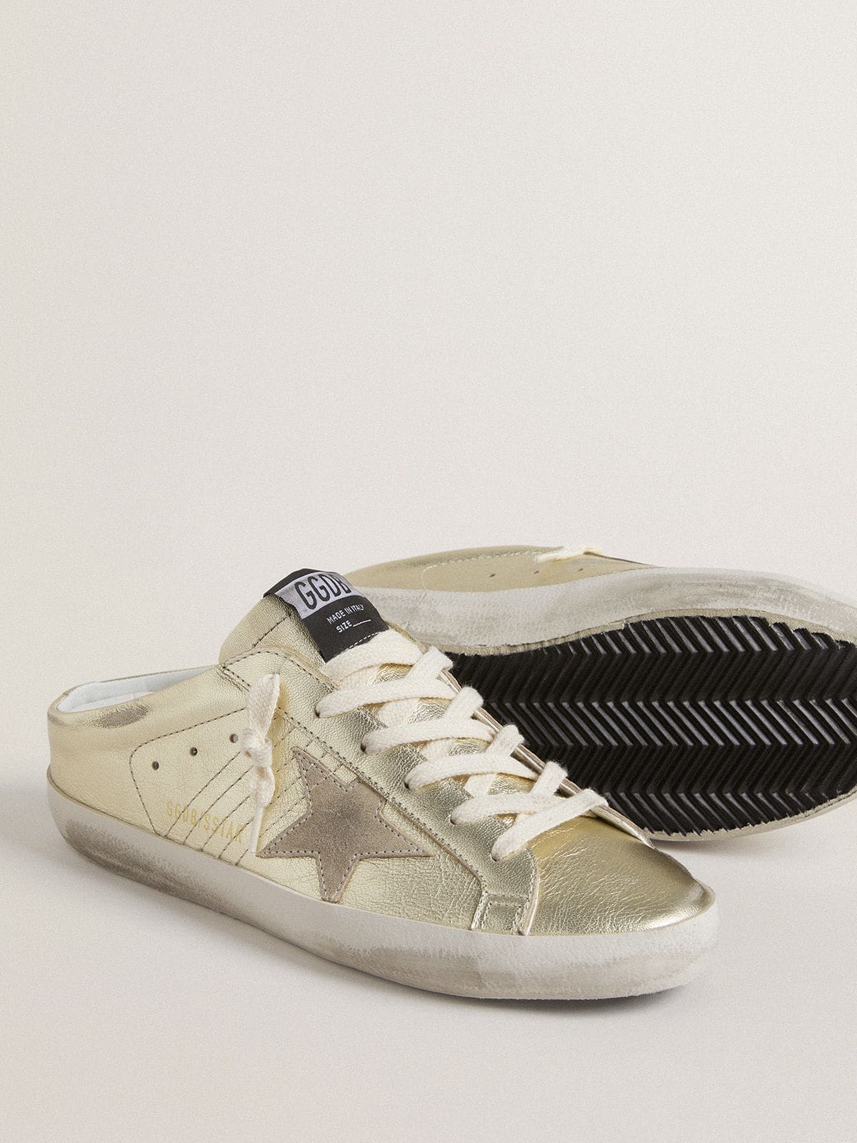Golden Goose - Super-Star Sabots in platinum foiled leather with beige suede star   in 