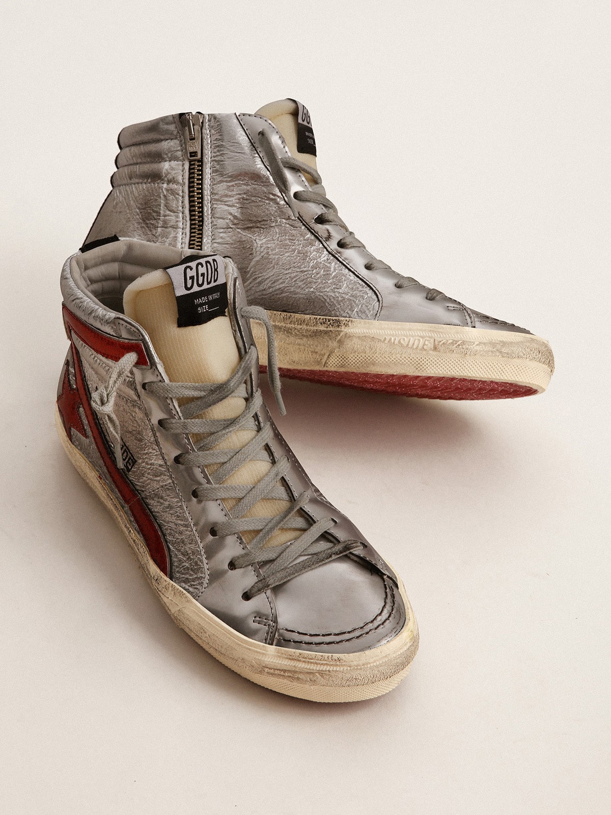 Women s Slide with silver metallic leather upper and red metallic leather flash Golden Goose