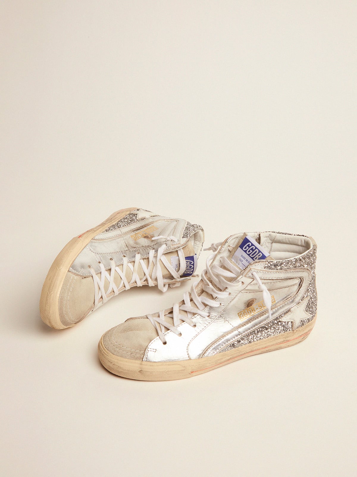 Women s Slide with laminated leather upper and silver glitter Golden Goose