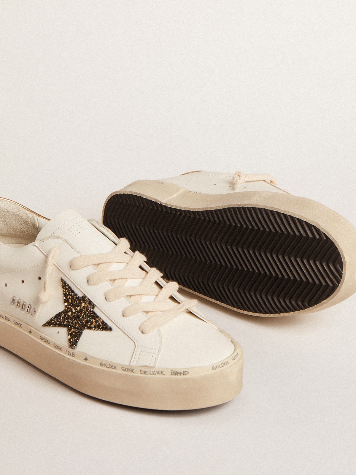 Hi Star LTD with black and gold glitter star and gold heel Hi Star LTD with black and gold glitter star and gold heel
