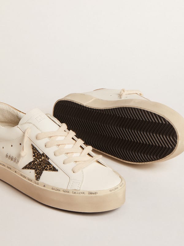 Golden Goose - Hi Star LTD with black and gold glitter star and gold heel tab in 
