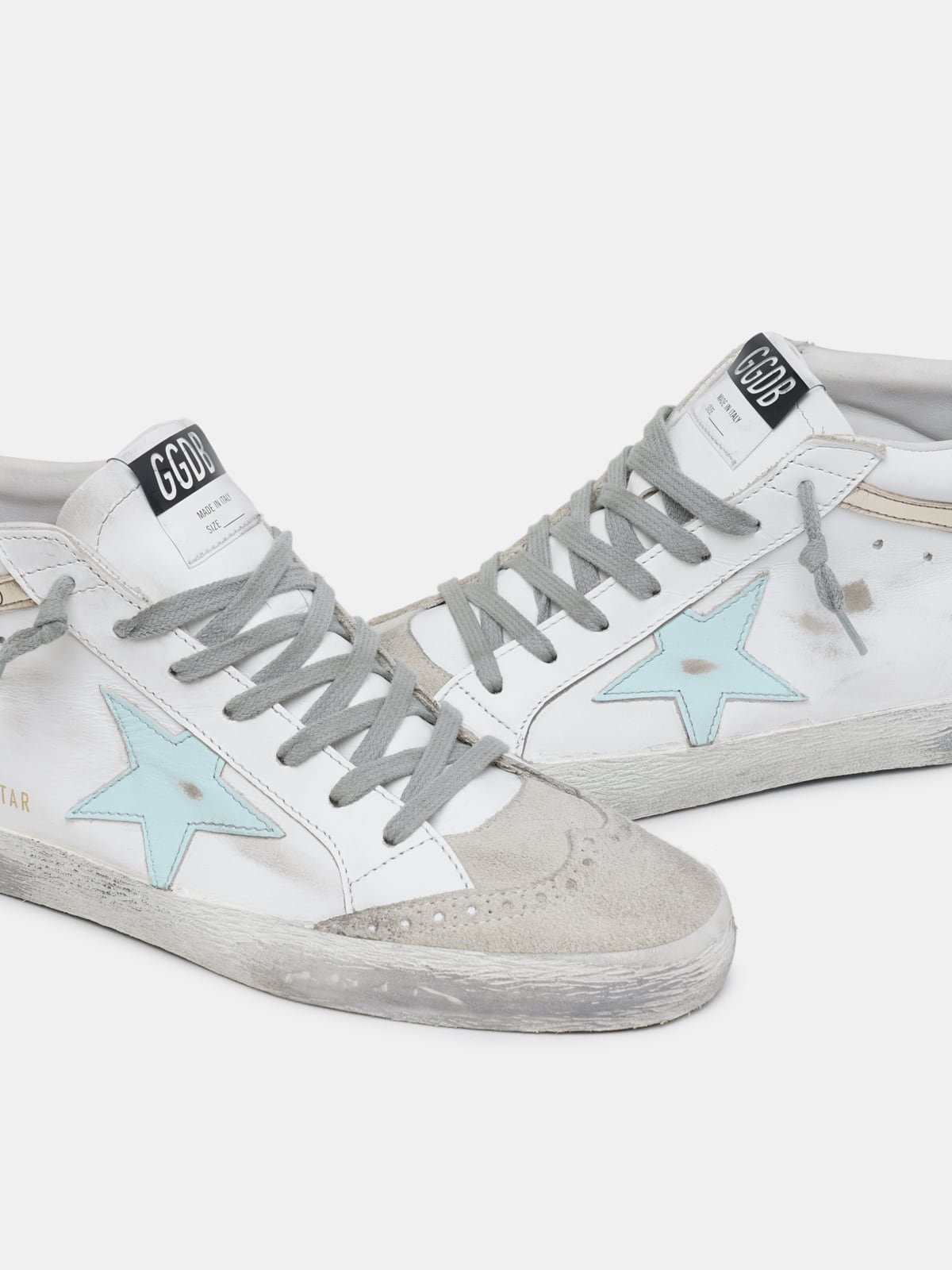 Golden Goose - Mid Star sneakers with "Love is everything" lettering in 