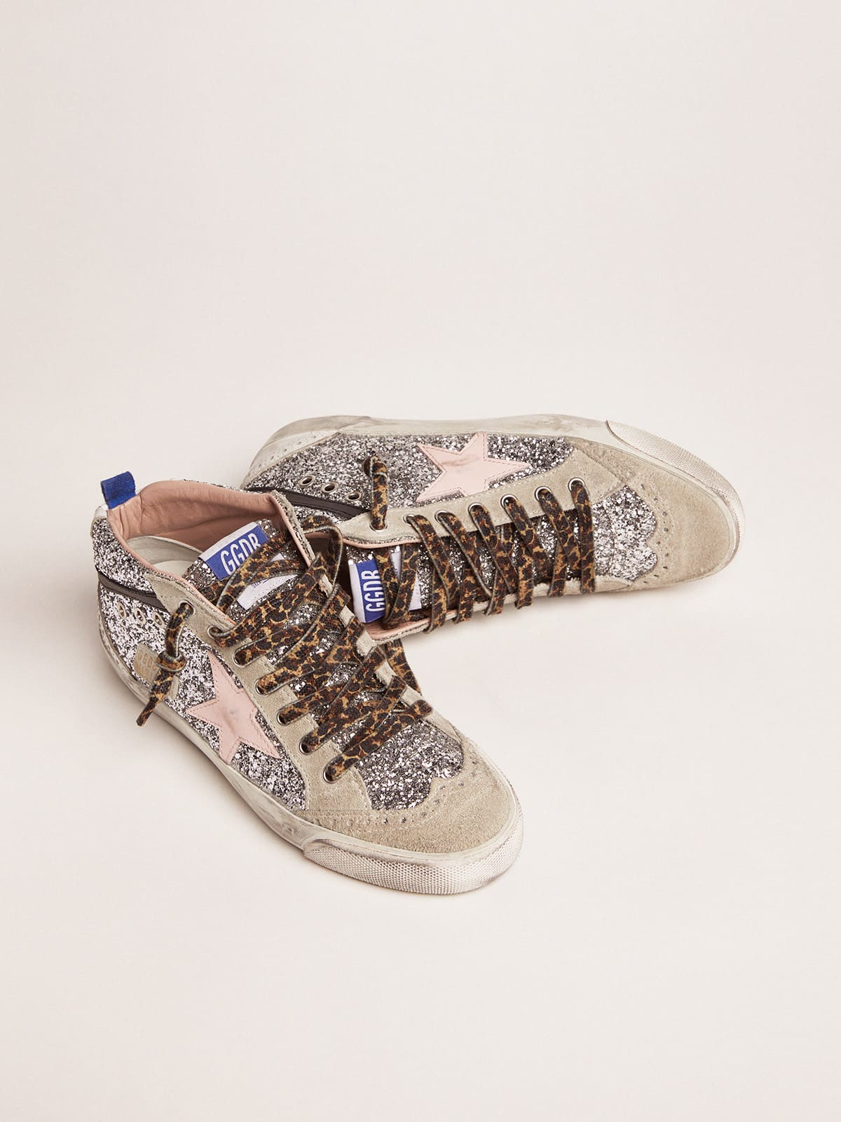 Golden Goose - Zapatillas deportivas Mid Star con pala de purpurina plateada y estrella rosa claro in 