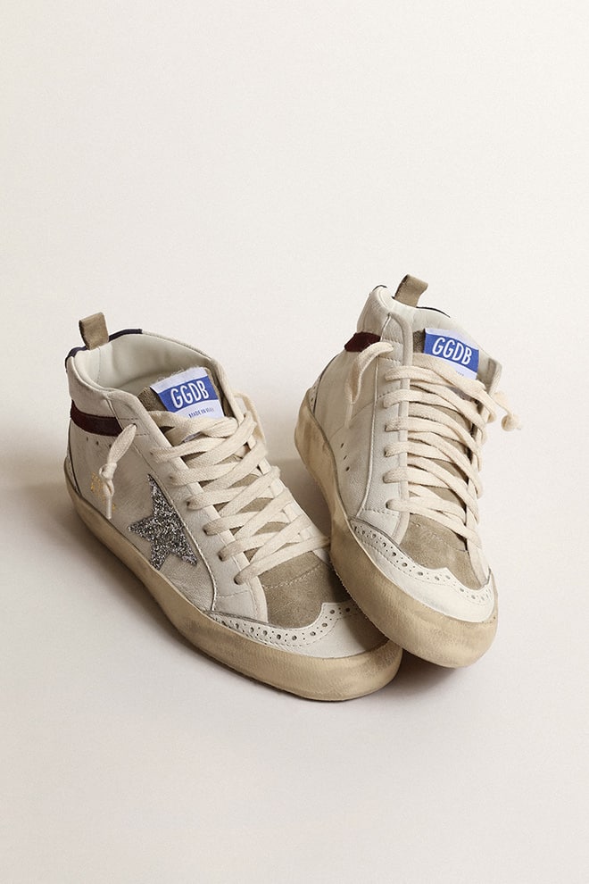 Golden Goose - Mid Star de mujer con estrella con purpurina plateada y refuerzo del talón de ante azul oscuro in 