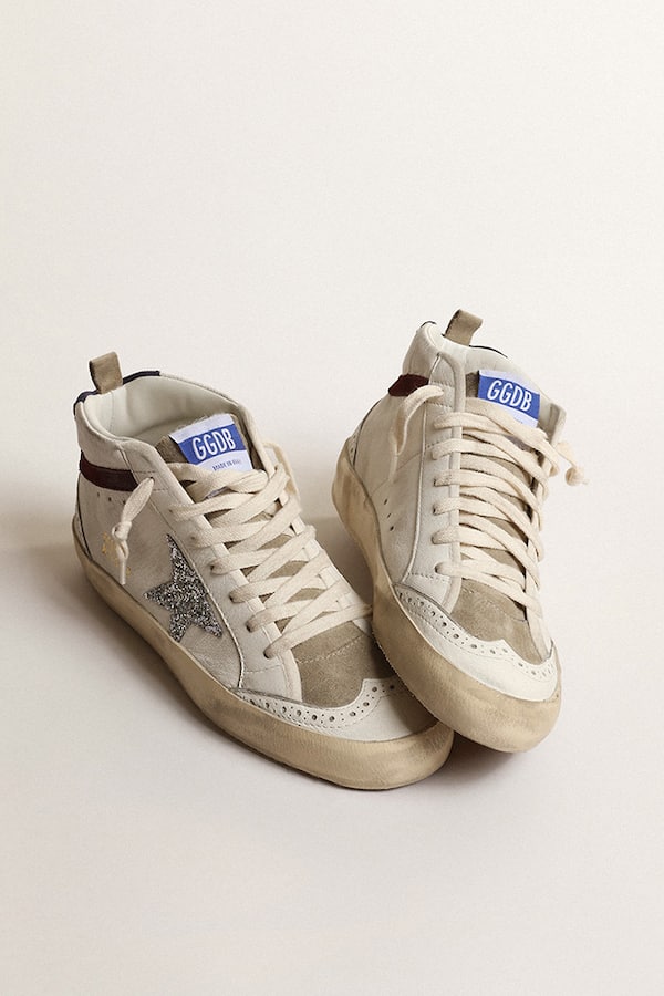 Golden Goose - Mid Star de mujer con estrella con purpurina plateada y refuerzo del talón de ante azul oscuro in 