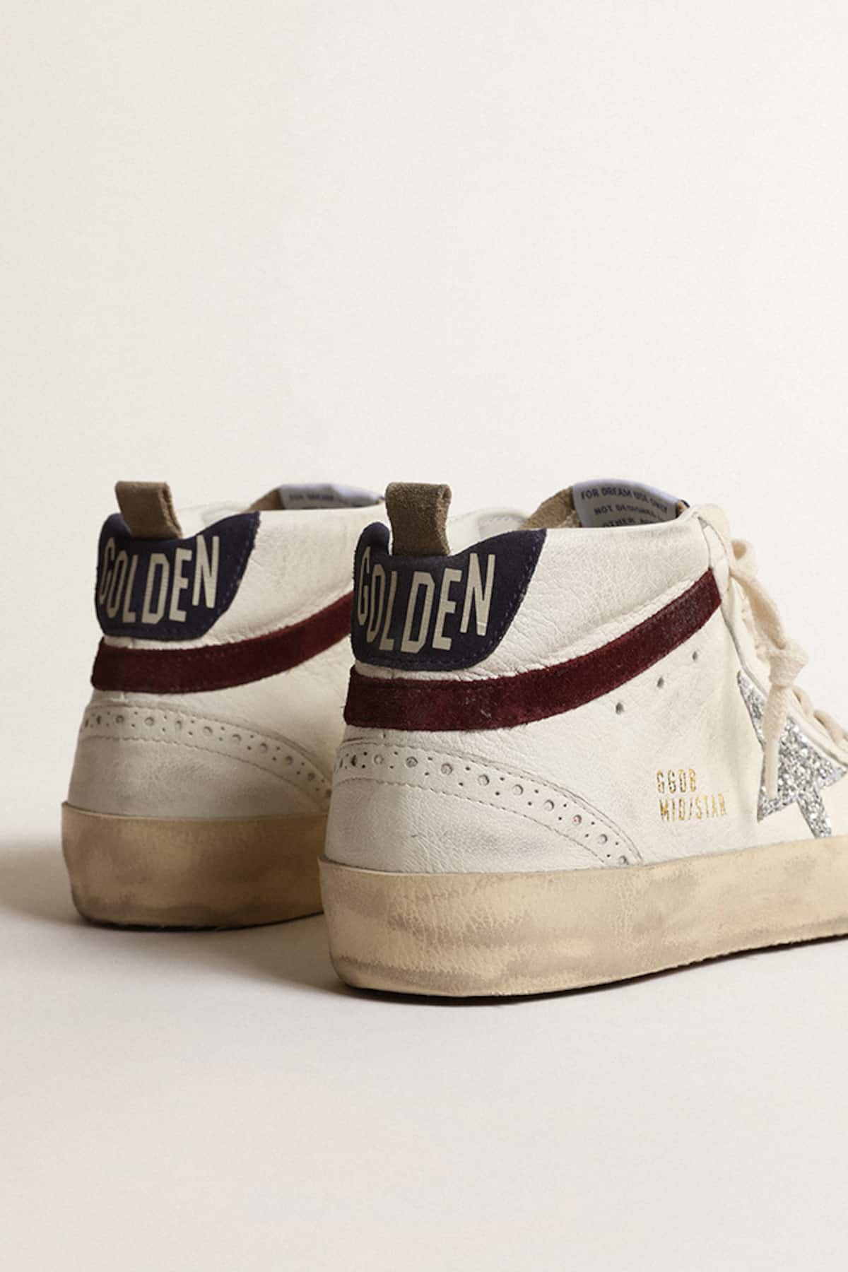 Golden Goose - Mid Star de mujer con estrella con purpurina plateada y refuerzo del talón de ante azul oscuro in 