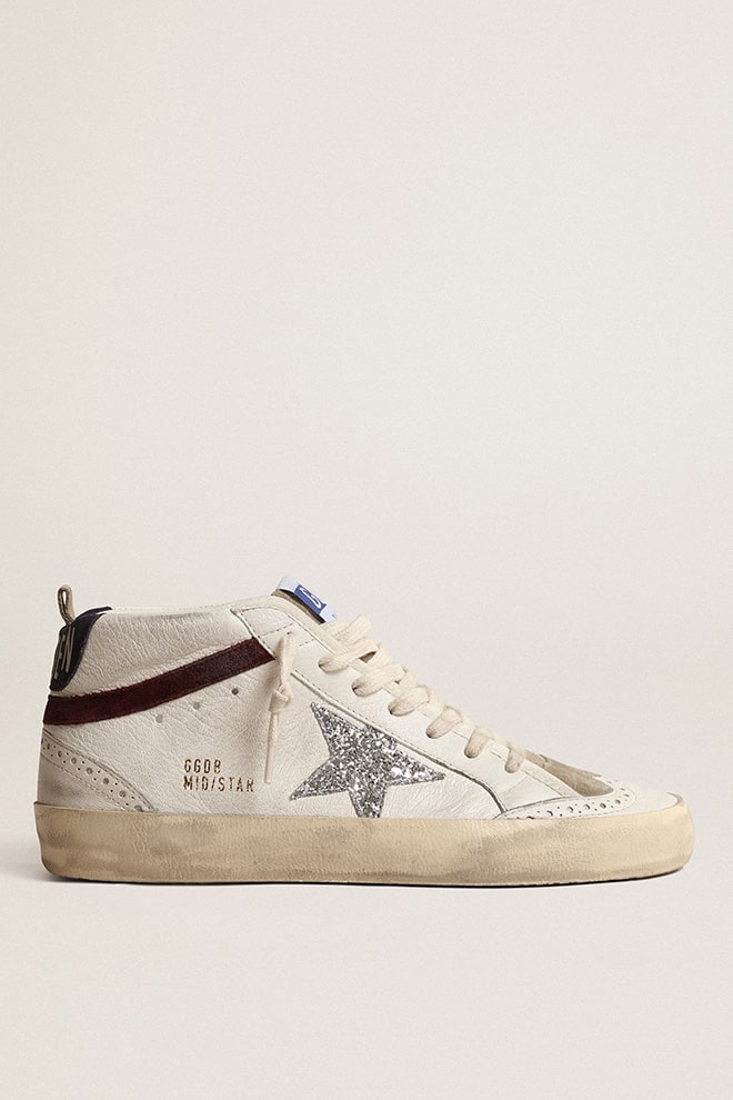Golden Goose - Mid Star de mujer con estrella con purpurina plateada y refuerzo del talón de ante azul oscuro in 