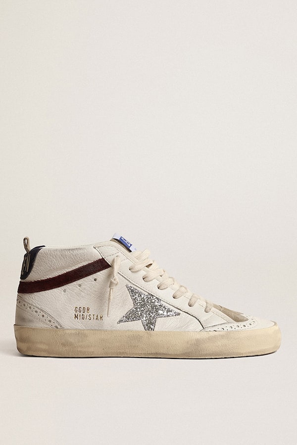 Golden Goose - Mid Star de mujer con estrella con purpurina plateada y refuerzo del talón de ante azul oscuro in 