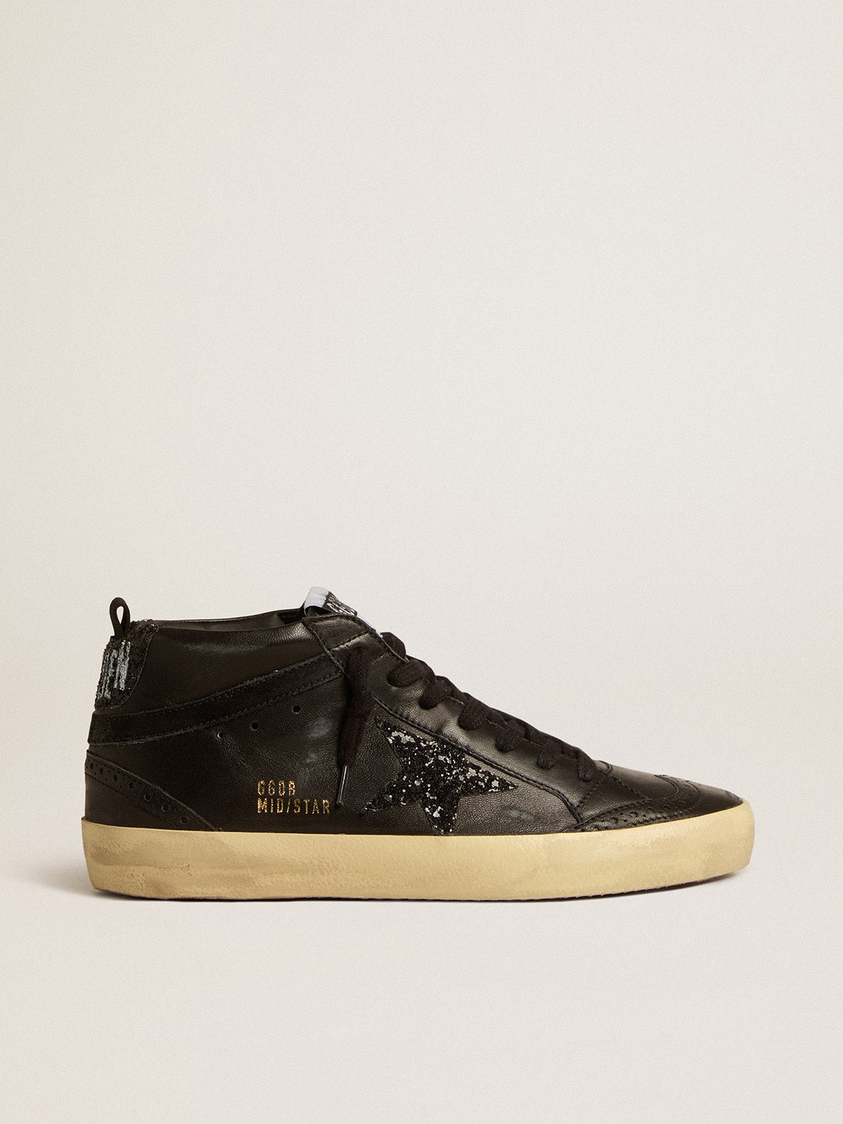 Golden Goose - Mid Star de napa negra con estrella con purpurina negra y detalle de «coma» de ante in 