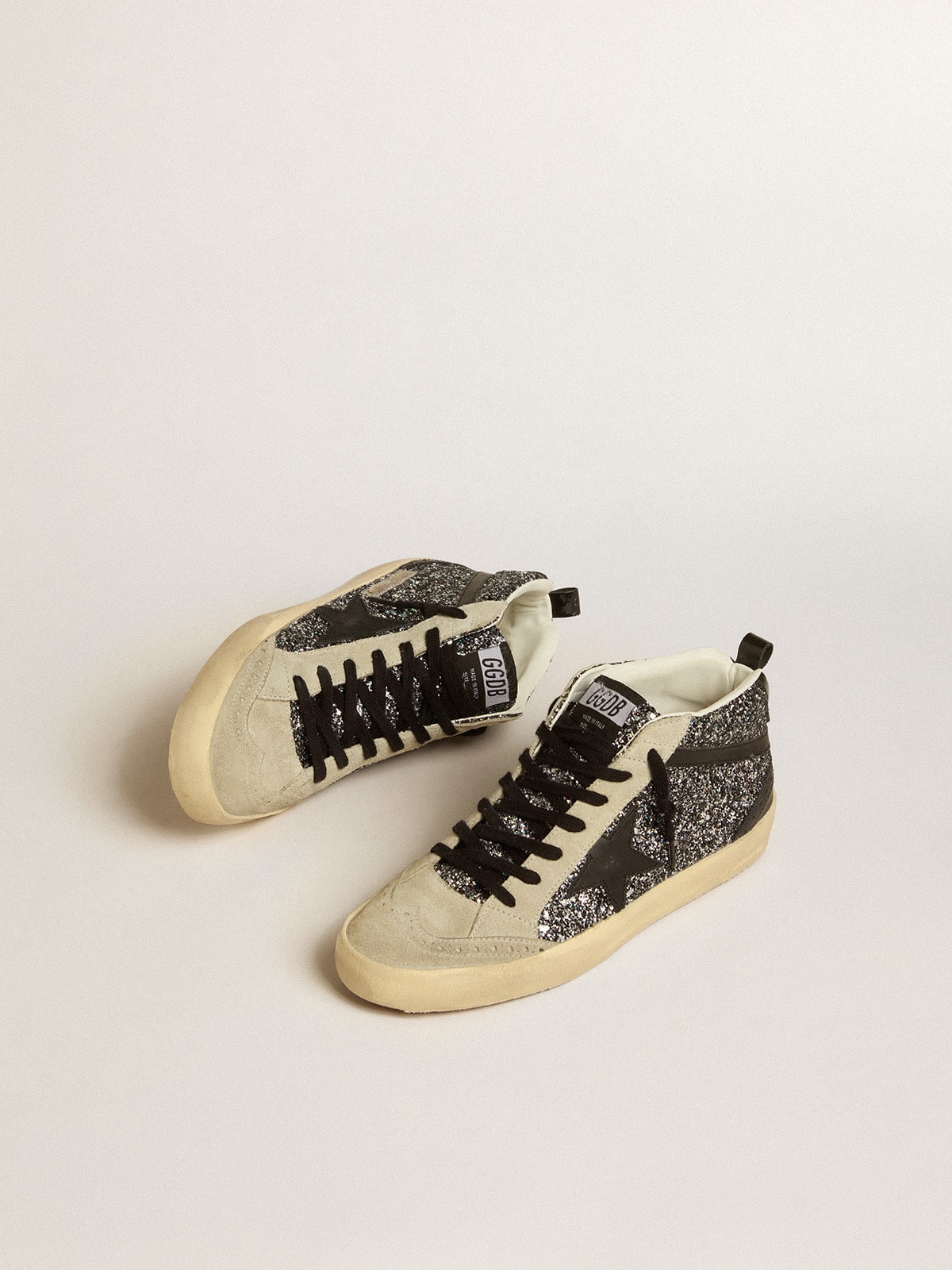 Golden Goose - Mid Star LTD con purpurina negra y estrella y detalle de «coma» de piel negra in 