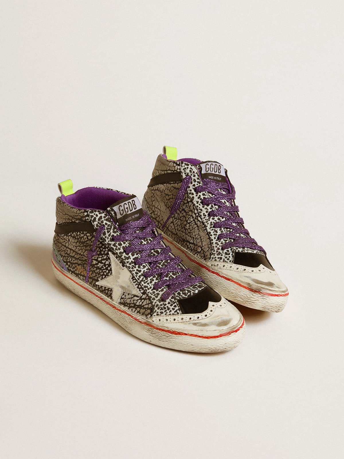 Women s Mid Star LAB in animal print leather with a white star Golden Goose