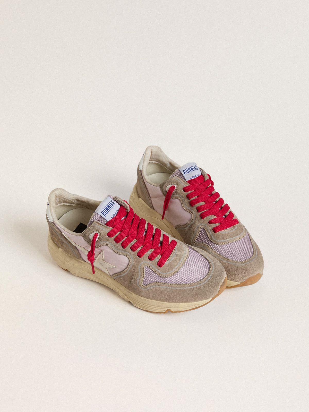 Running Sole LTD de nailon rosa con estrella de piel blanca