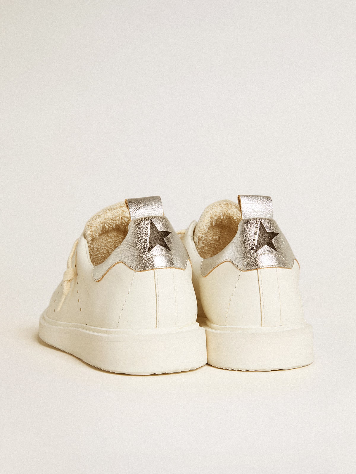 Women s Starter LTD in white leather with silver metallic leather heel tab Golden Goose