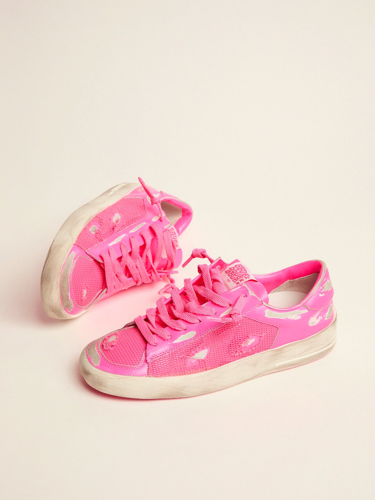 Golden Goose - Damensneakers Stardan aus Leder und Mesh in Neonrosa in 