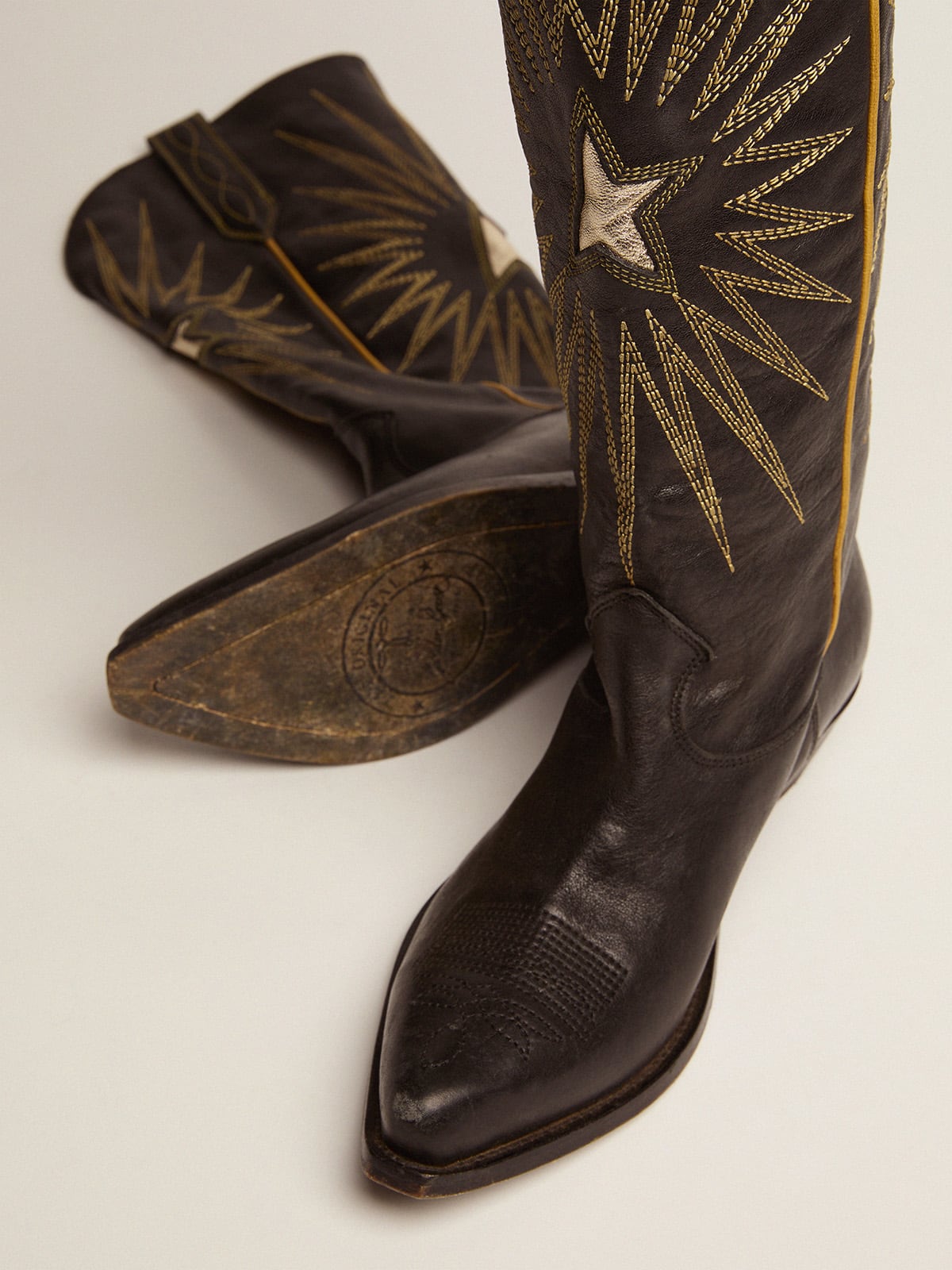 Golden Goose - Women's boots in black leather with platinum star inlay in 