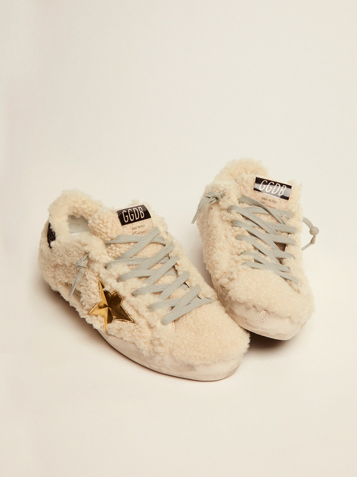 Golden Goose - Tênis Super-Star de shearling e estrela 3D dourada in 