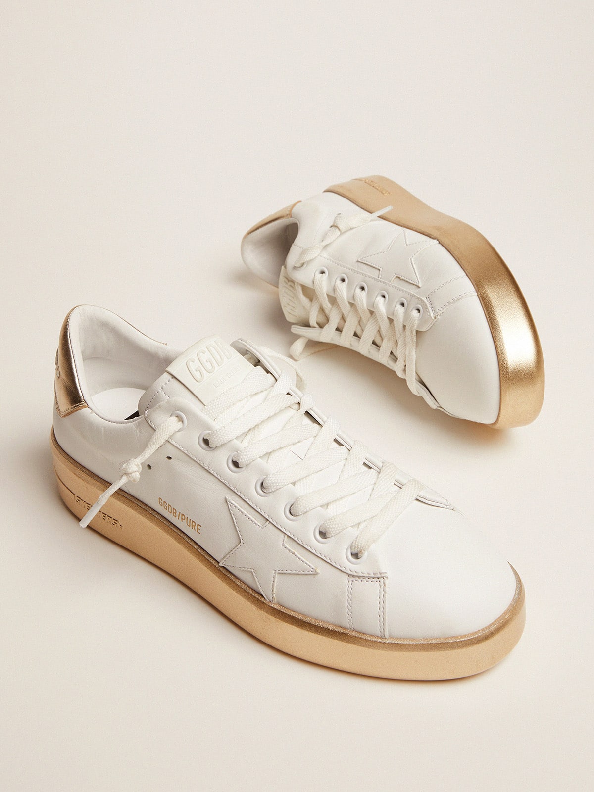 Golden Goose - Purestar sneakers in leather with foxing and gold laminated leather heel tab in 