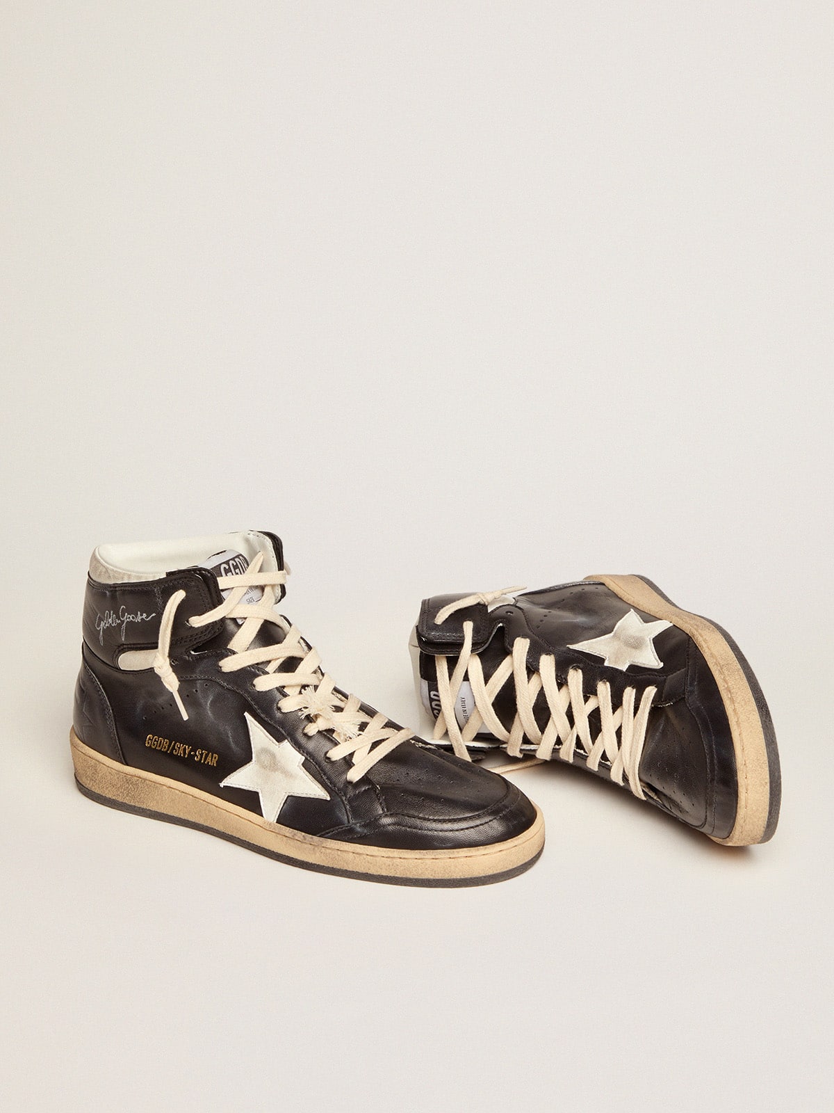 Women s Sky Star in black nappa with white star Golden Goose