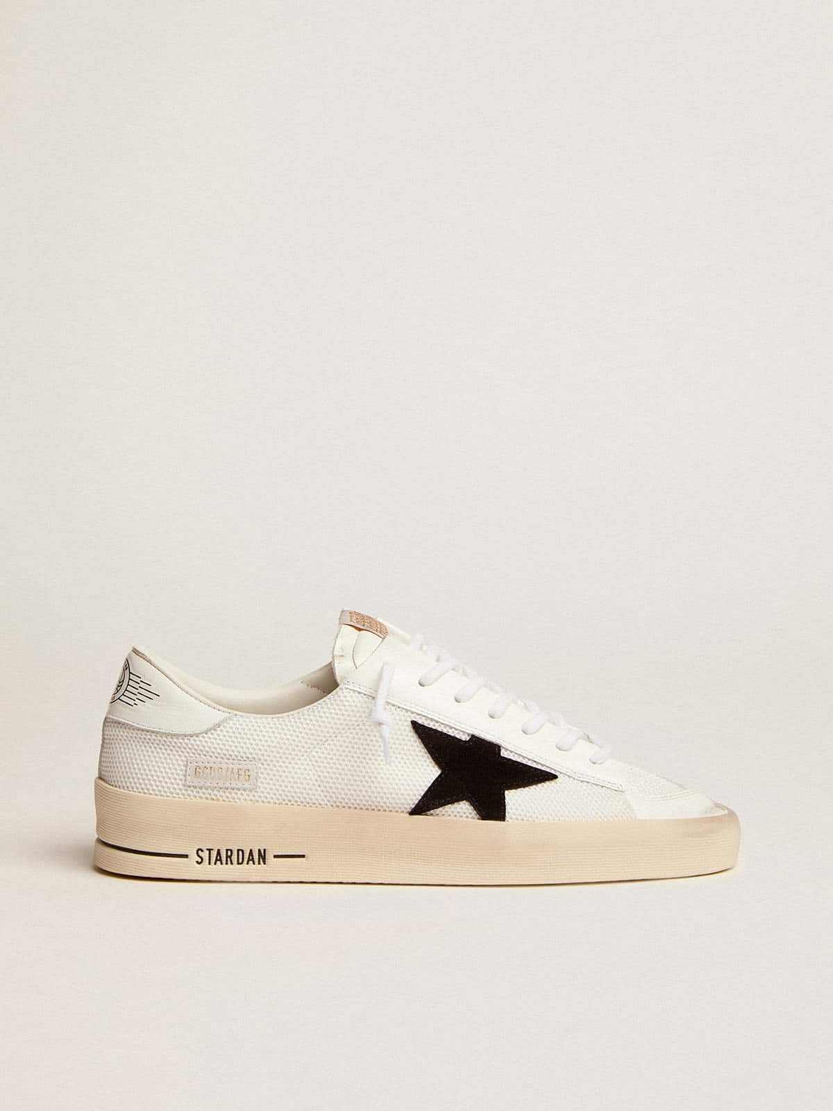 Golden Goose - Stardan with white leather and mesh inserts and black suede star in 