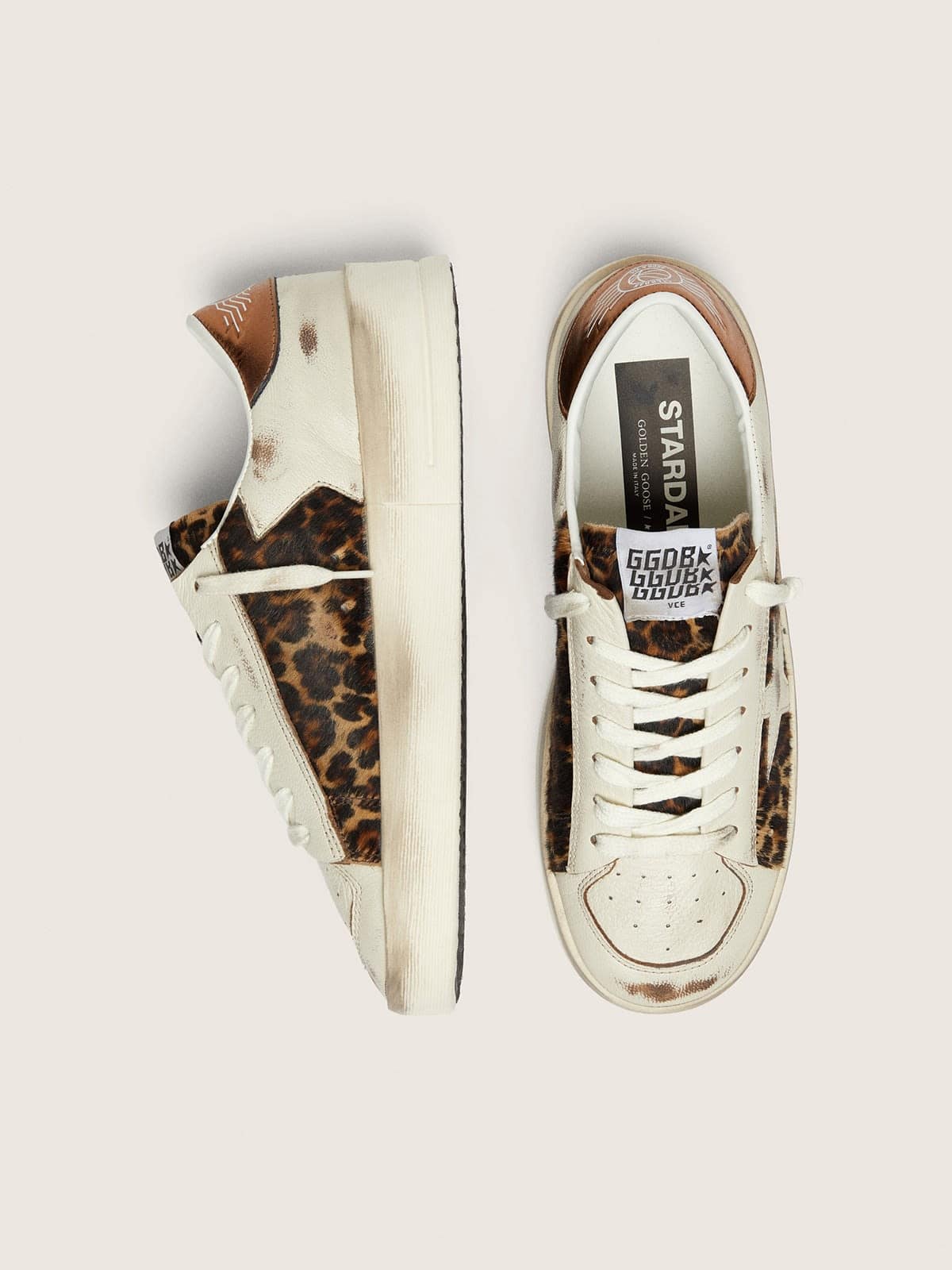 Golden Goose - Stardan feminino de couro branco e cavalinho com estampa de leopardo com estrela de couro branco in 