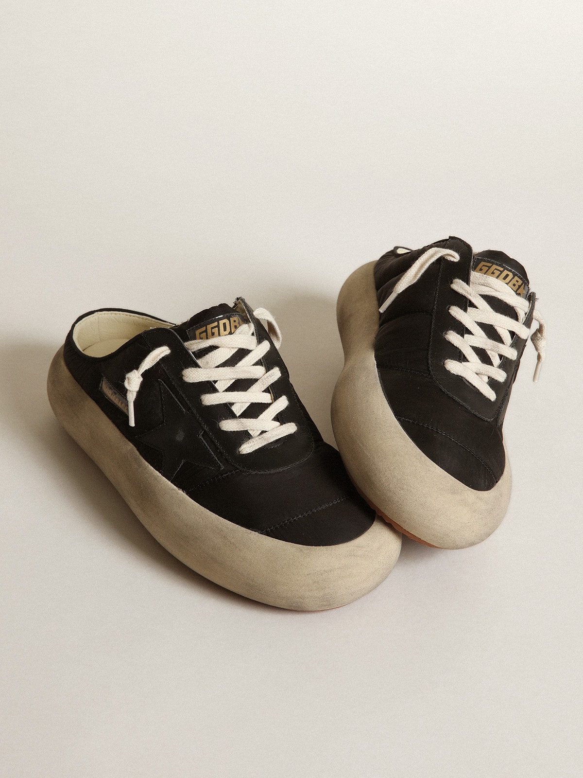 Golden Goose - Women's Space-Star Sabots with leather star and shearling lining in 