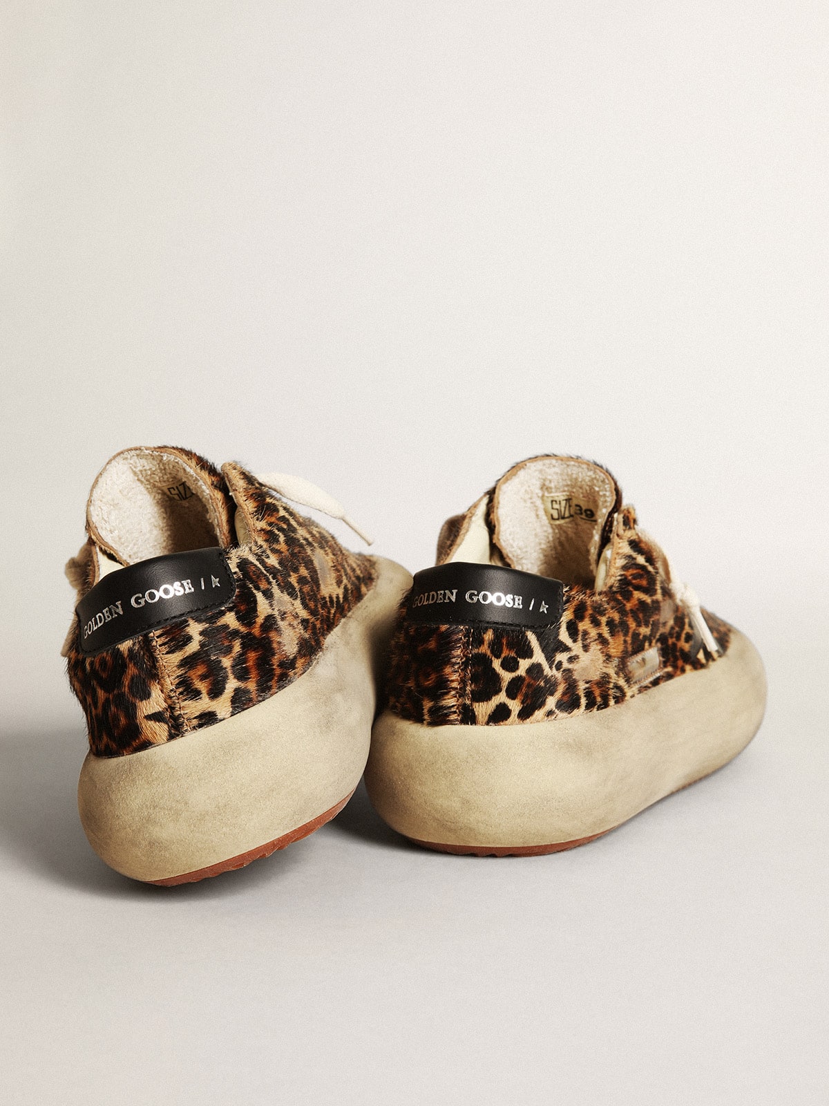 Women s Space Star in leopard print pony skin with black star Golden Goose