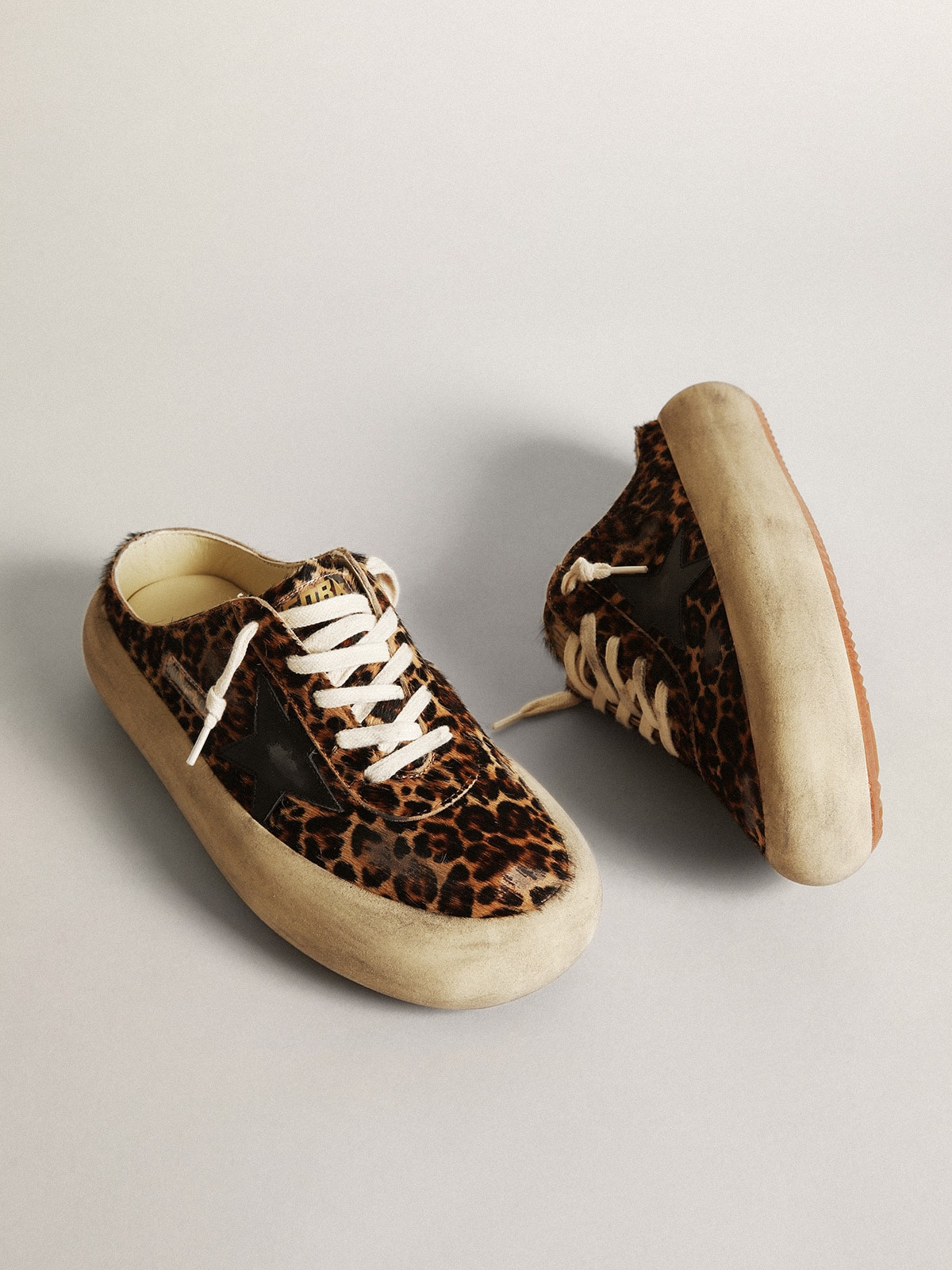 Women's Space-Star Sabot in leopard print pony skin with black star