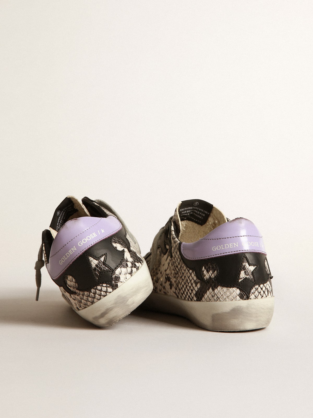 Golden Goose - Sneakers Super-Star à imprimé python avec étoile argentée in 