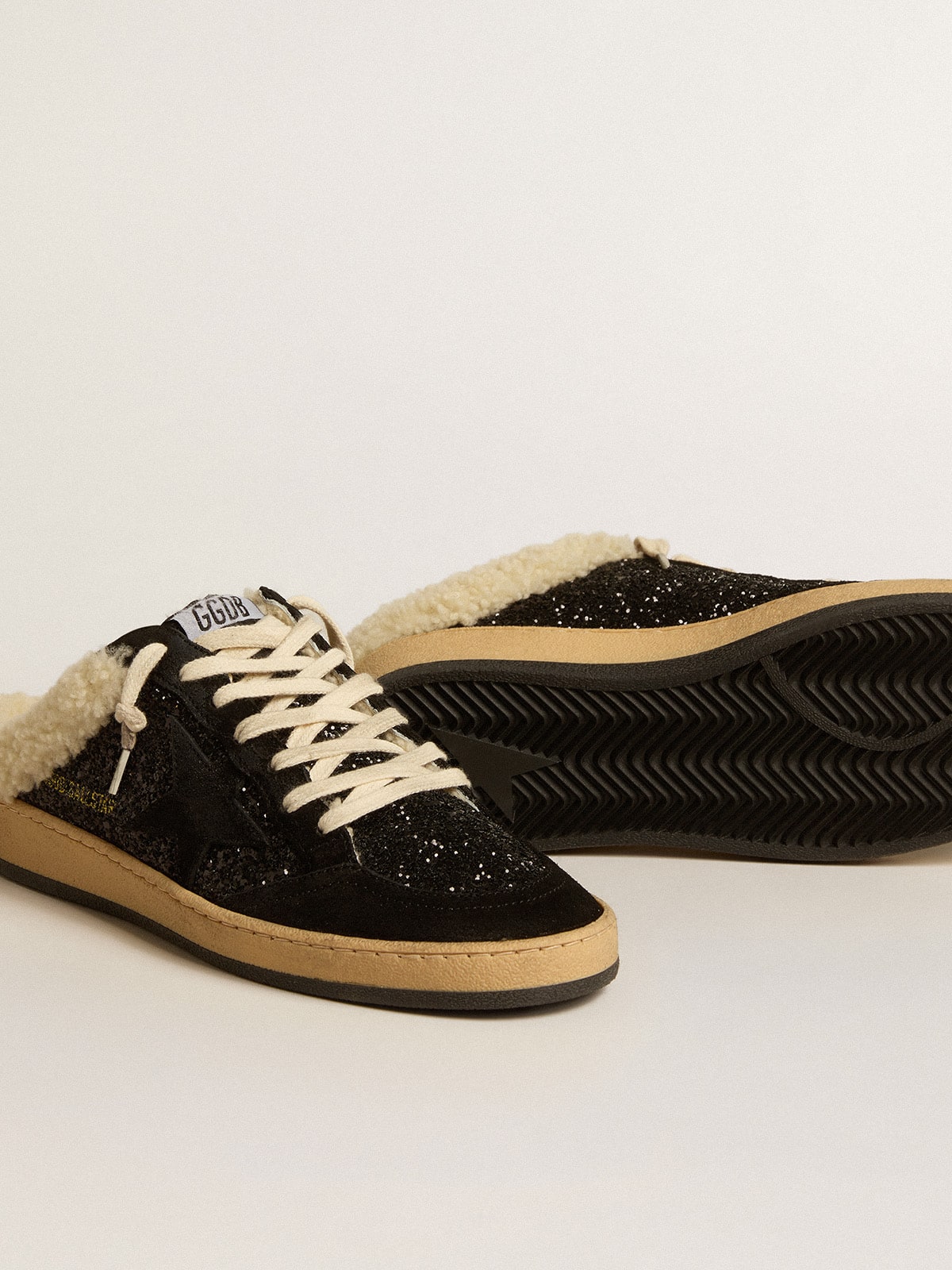 Golden Goose - Ball Star Sabots in black glitter with black star and shearling lining in 