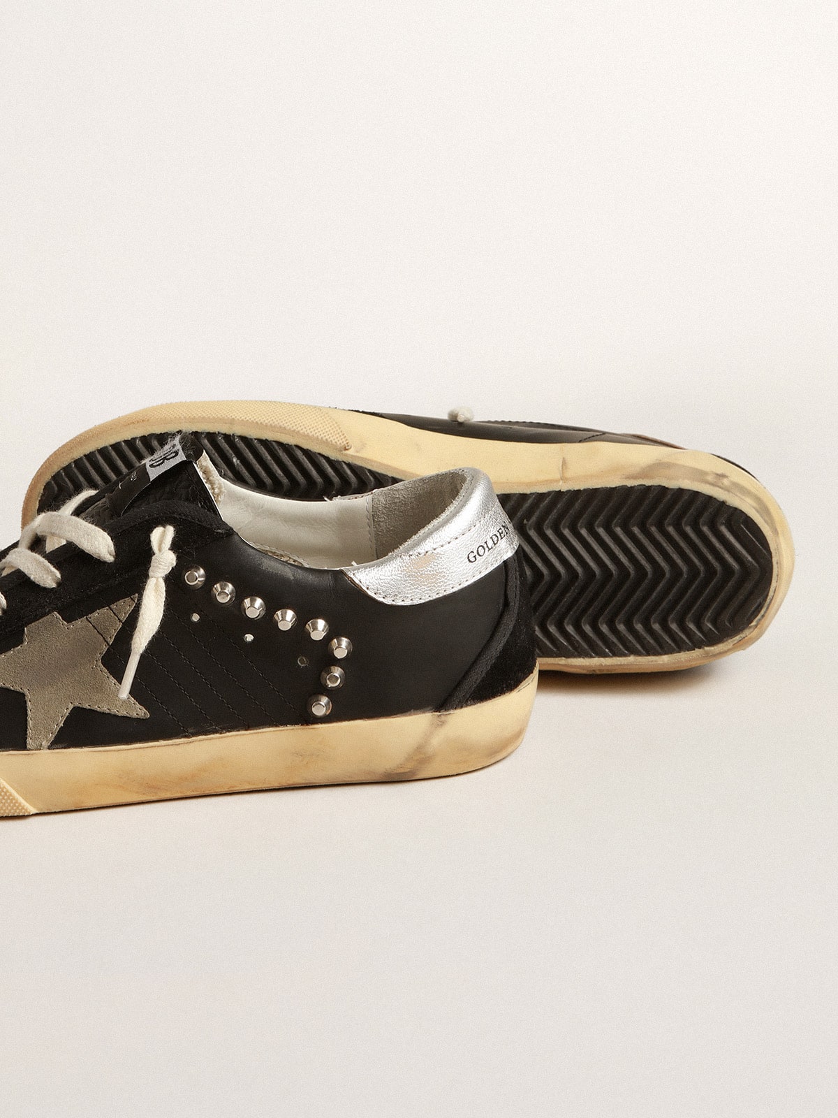 Women s Super Star in black leather and suede with silver studs Golden Goose