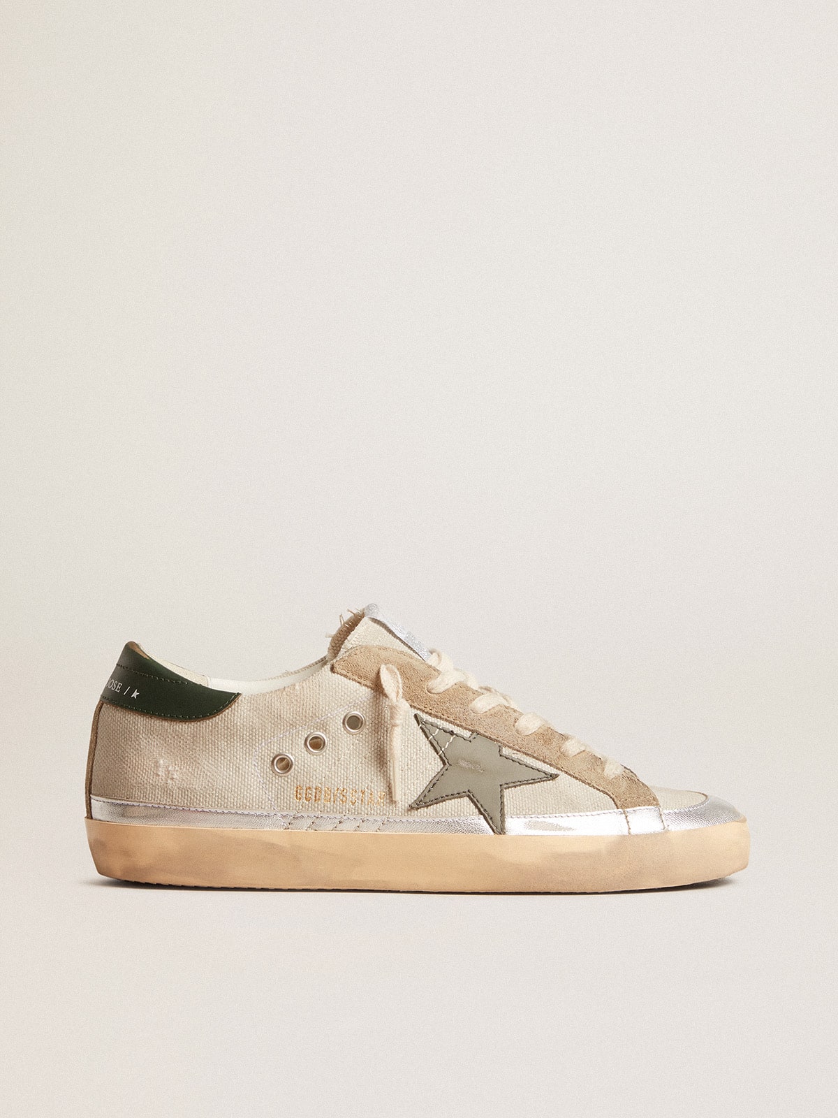 Golden Goose - Super-Star de lona gris con estrella y refuerzo del talón de piel verde in 