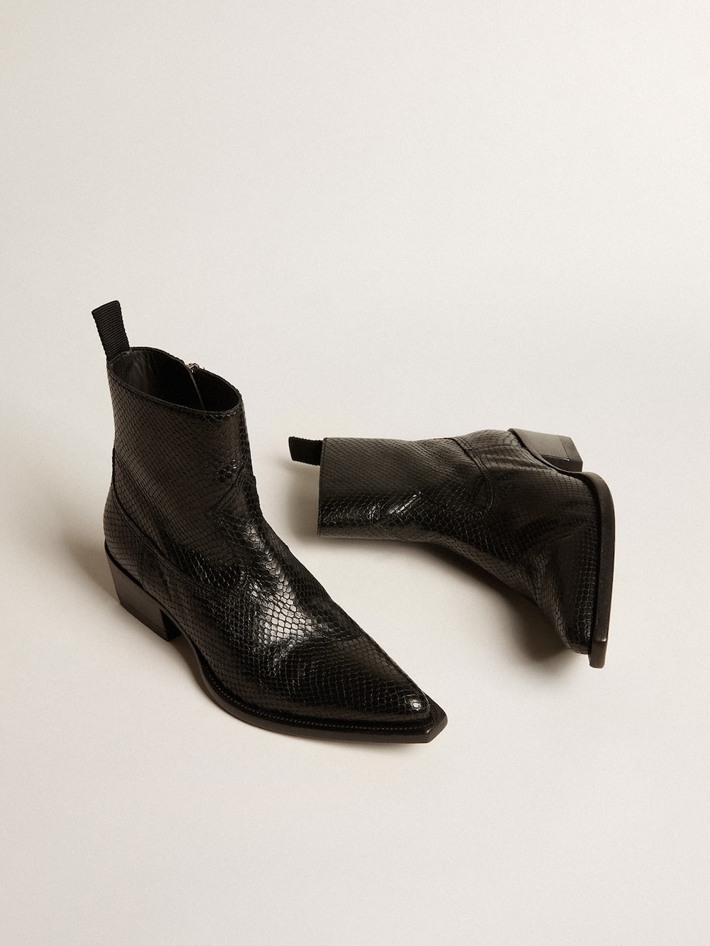 Golden Goose - Low Debbie boots in black snake-print leather in 