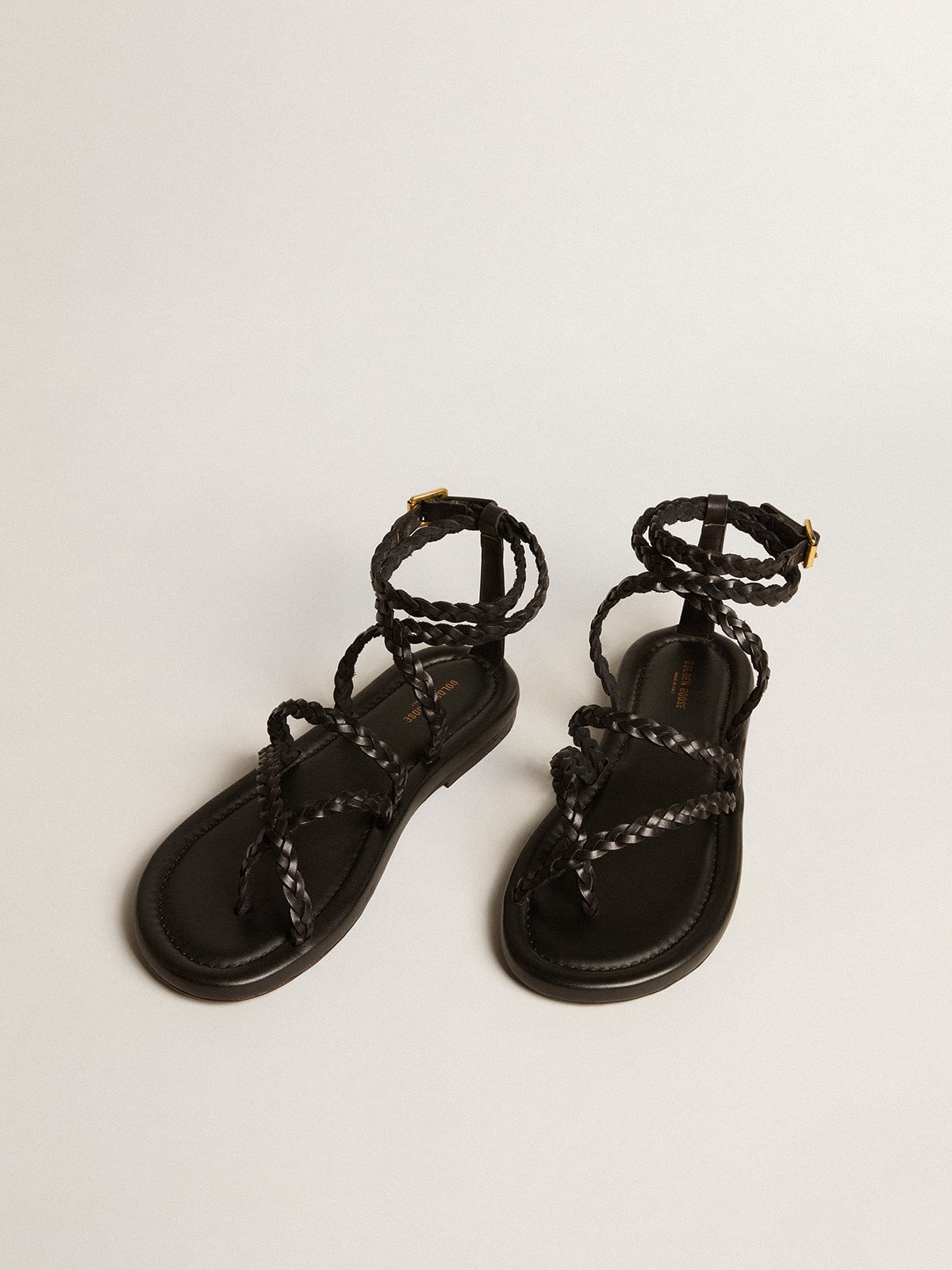 Penelope flat sandals in black leather